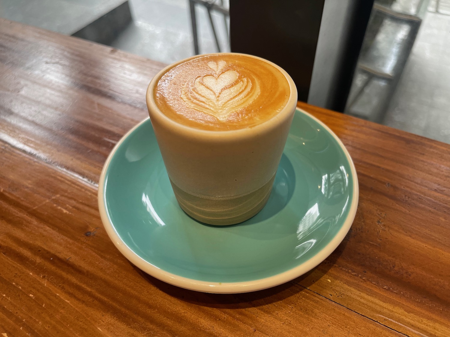 a cup of coffee on a saucer