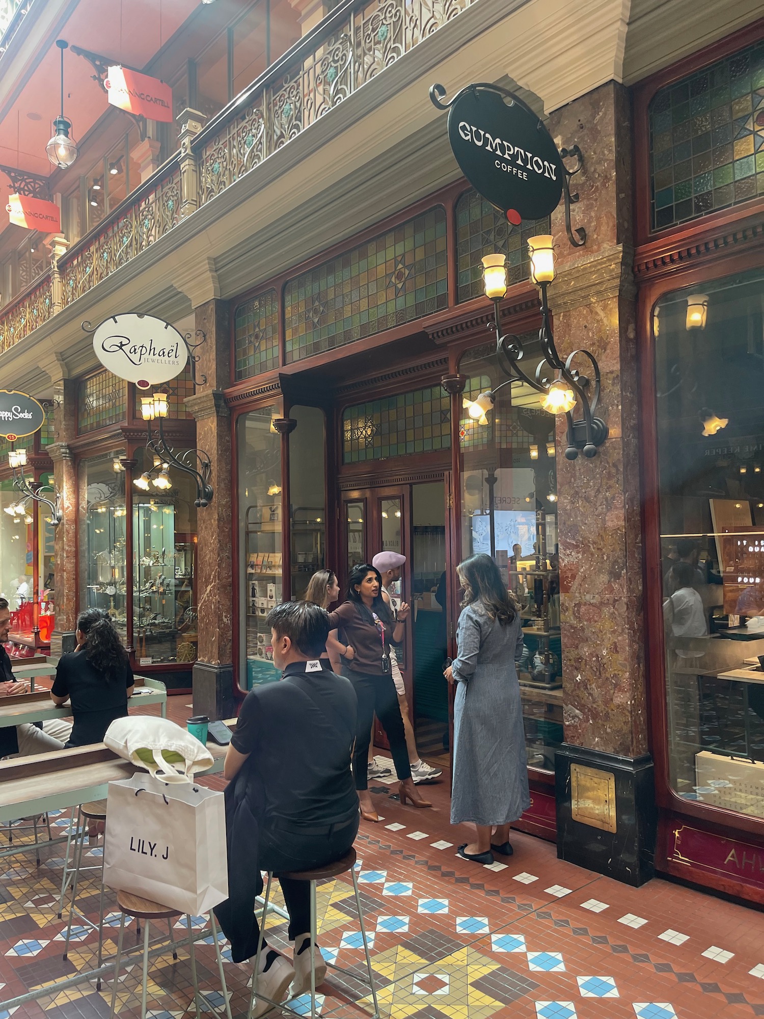 people standing in a courtyard