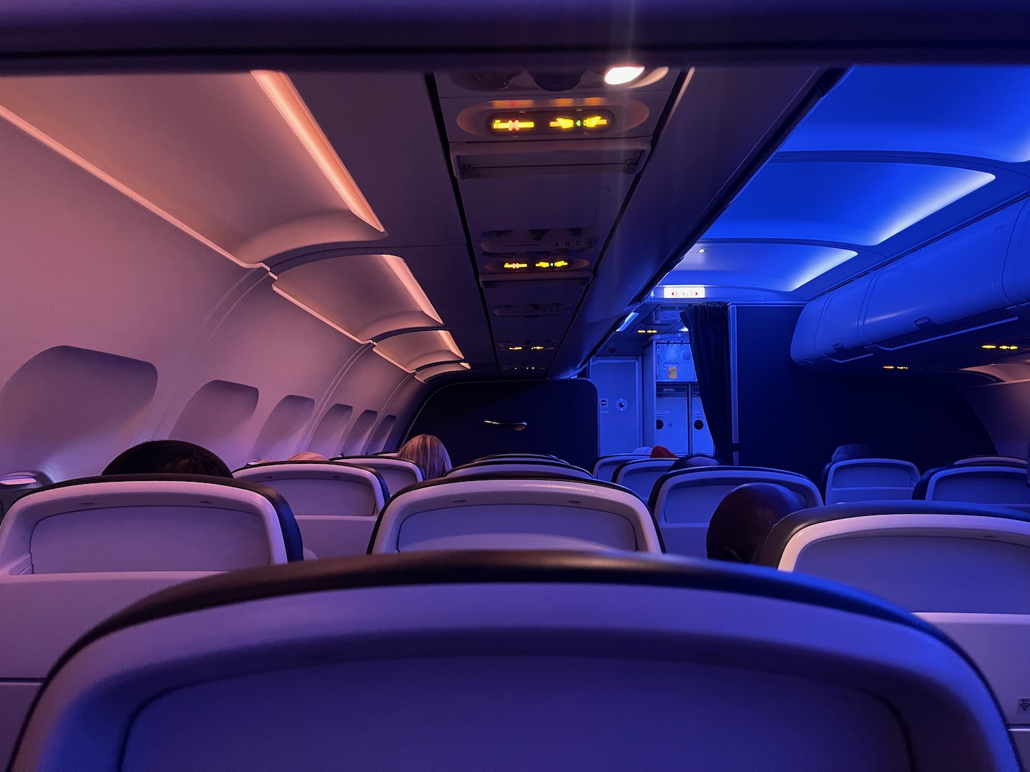 an airplane with seats and lights