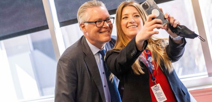 a man and woman taking a selfie