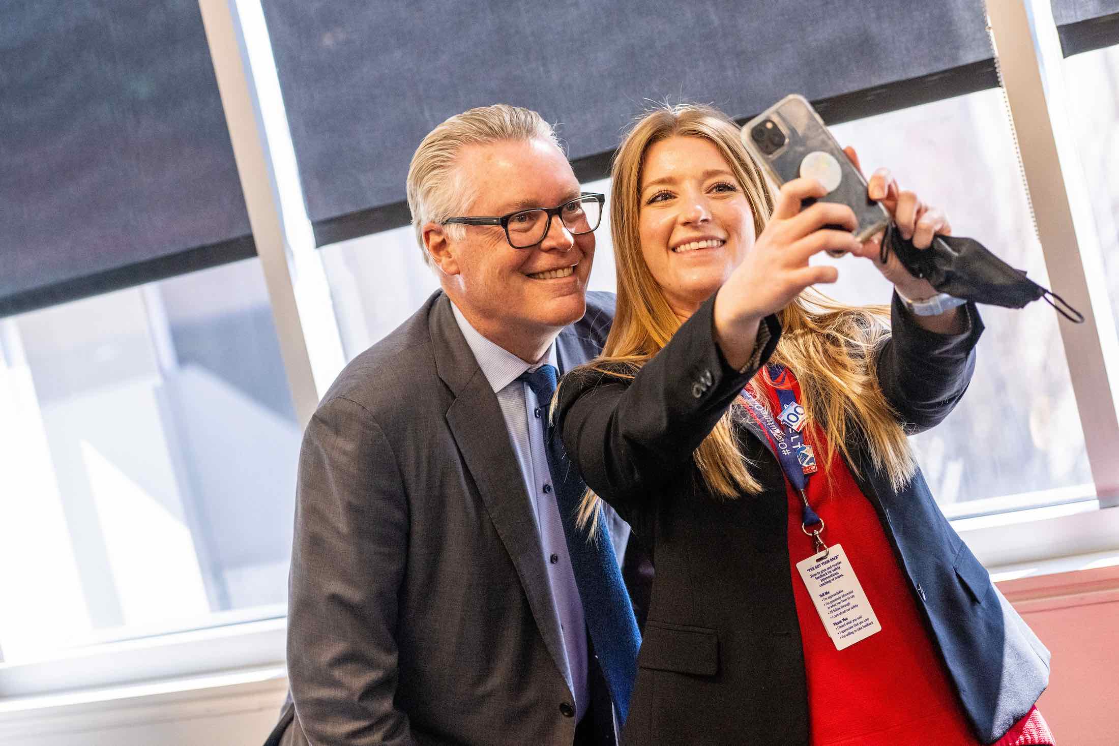 a man and woman taking a selfie