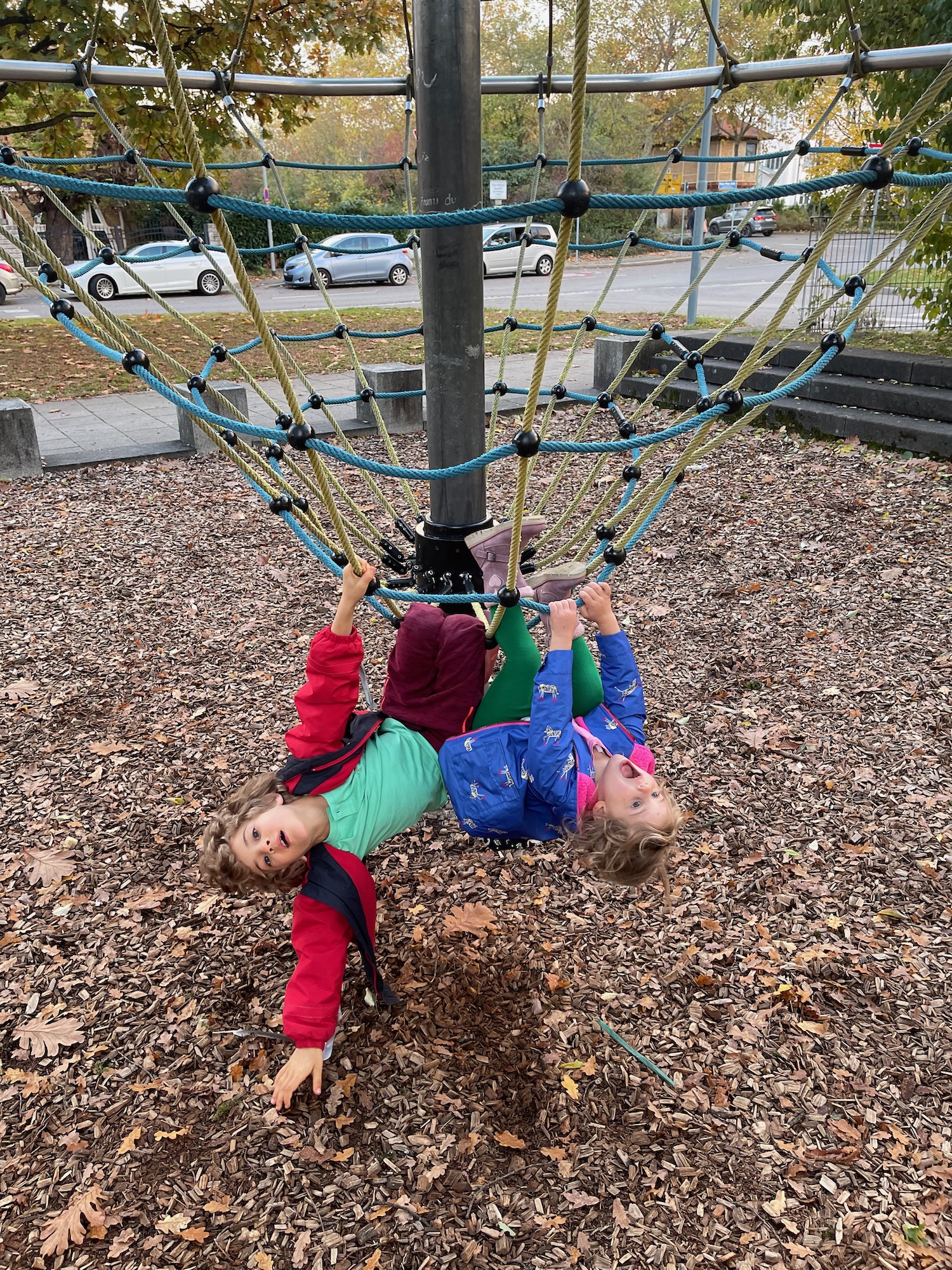 two children playing on a playground