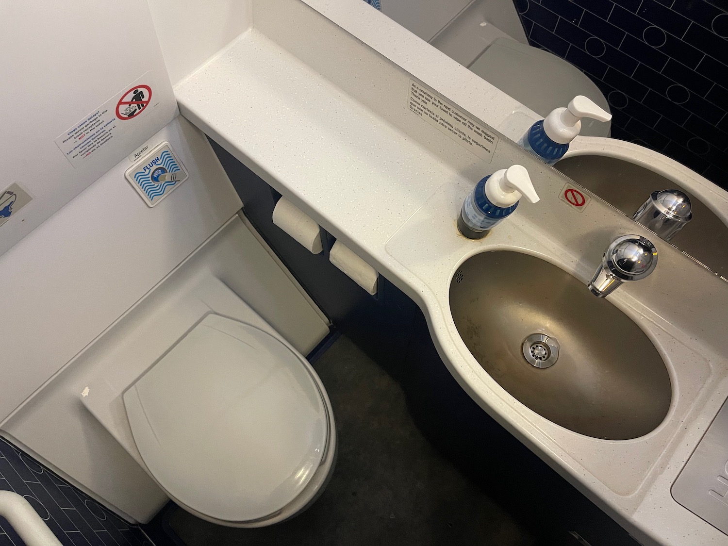 a sink and toilet in a bathroom