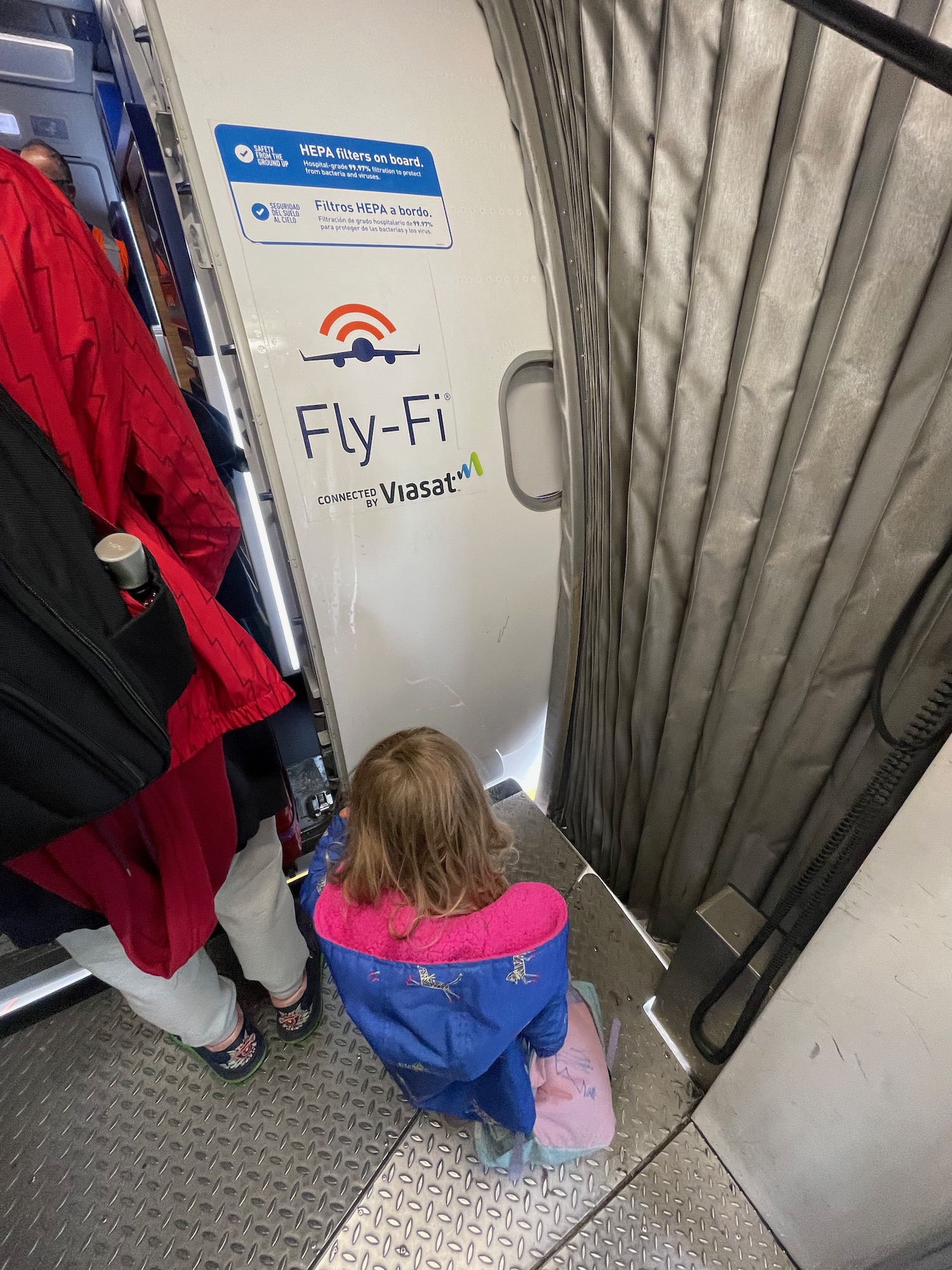 a girl looking up at a door