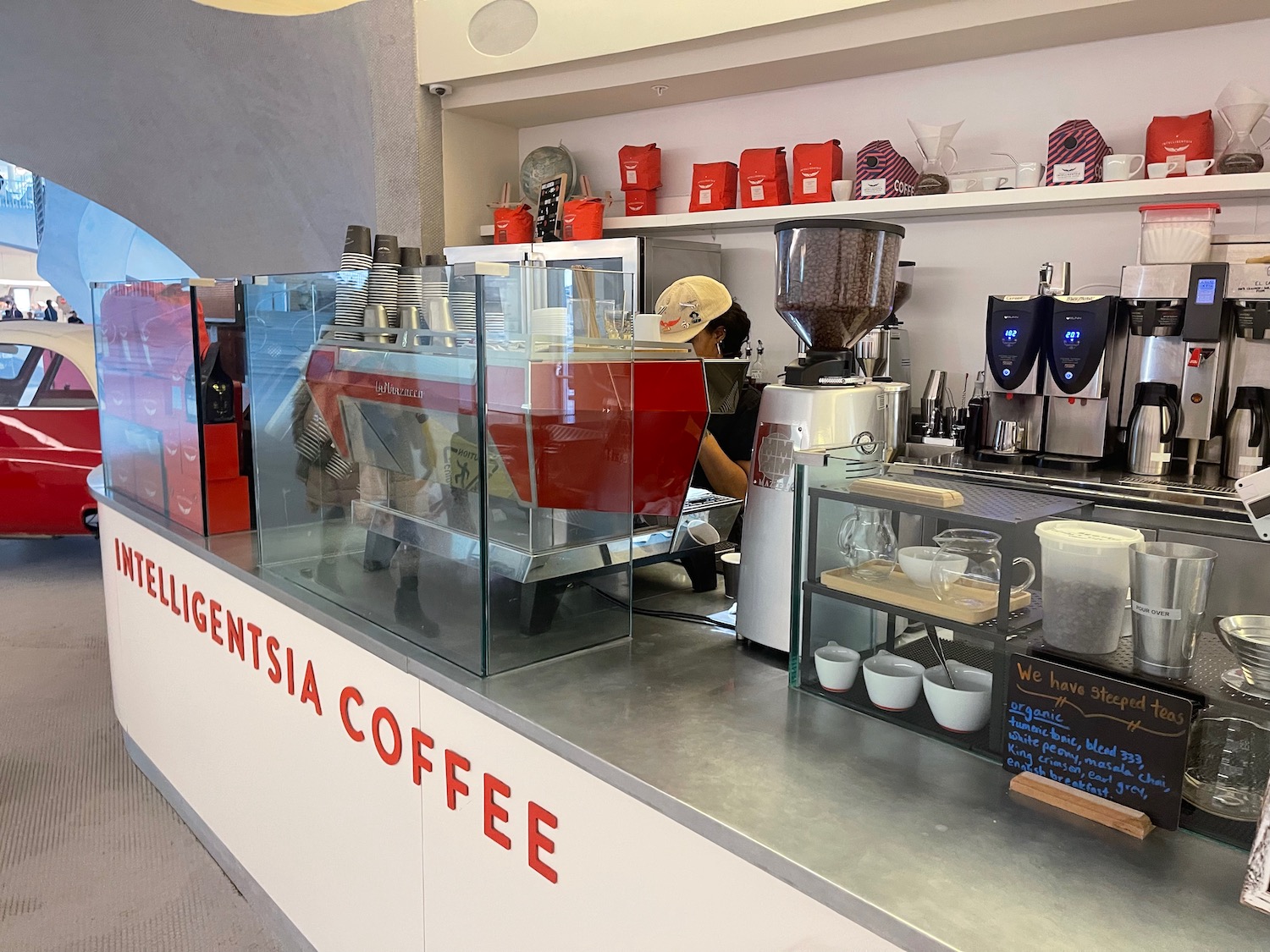 a woman working at a coffee shop