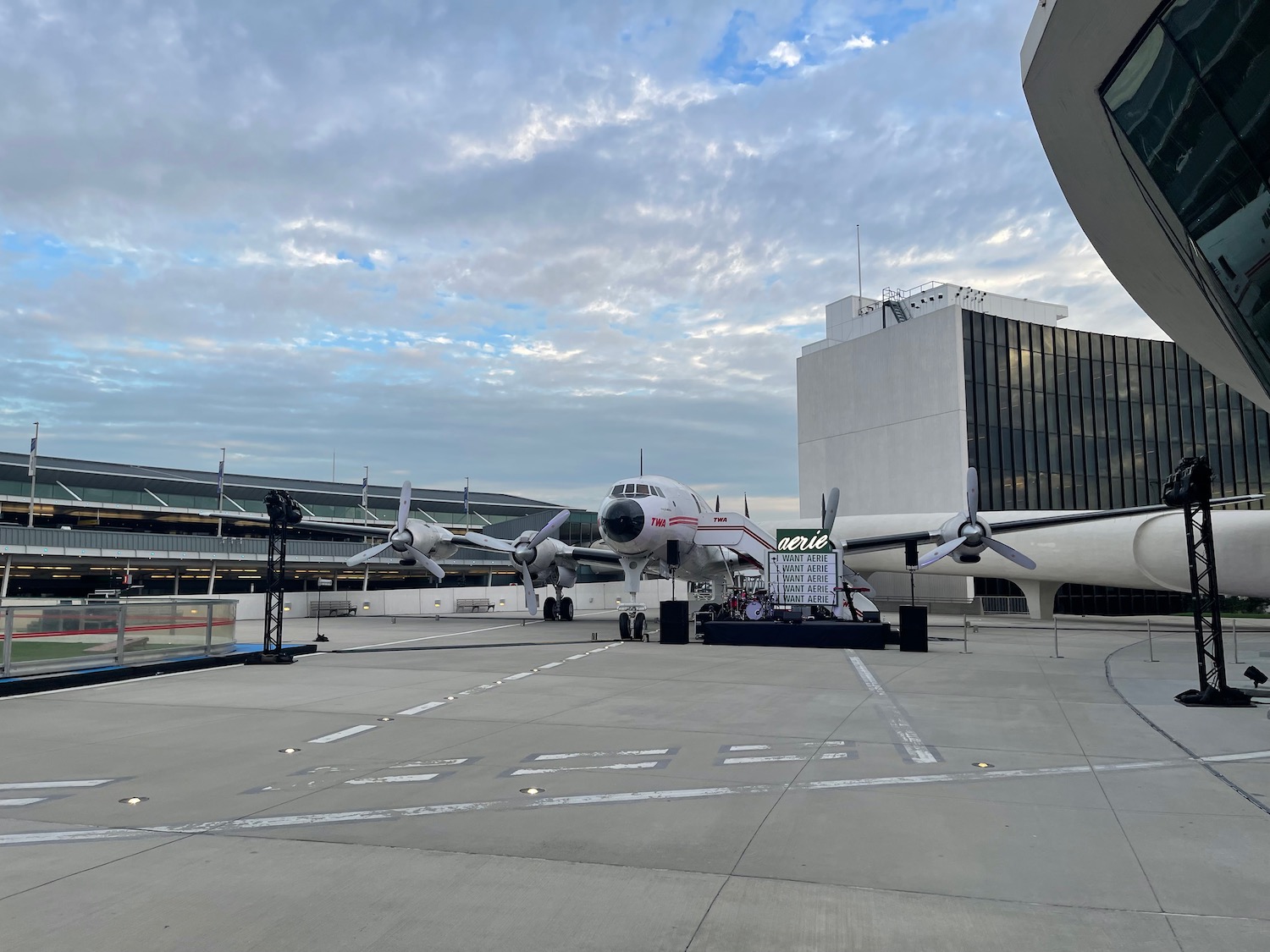 a group of airplanes in a terminal