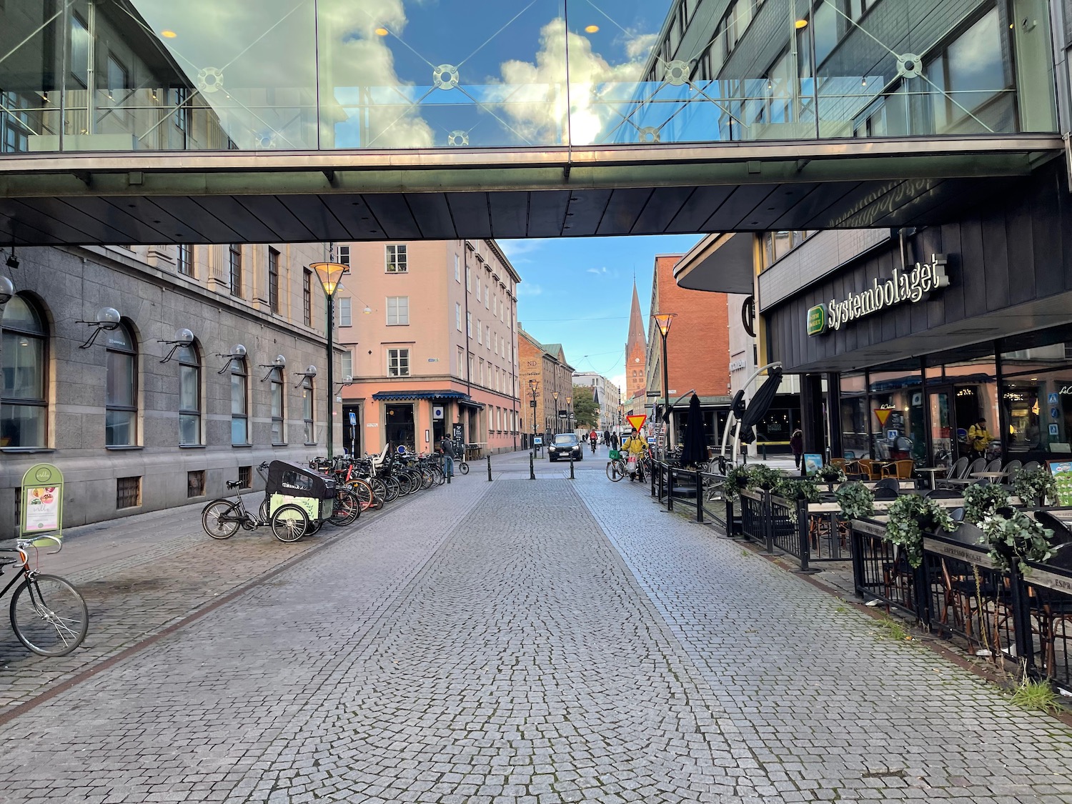 a street with a bridge over it