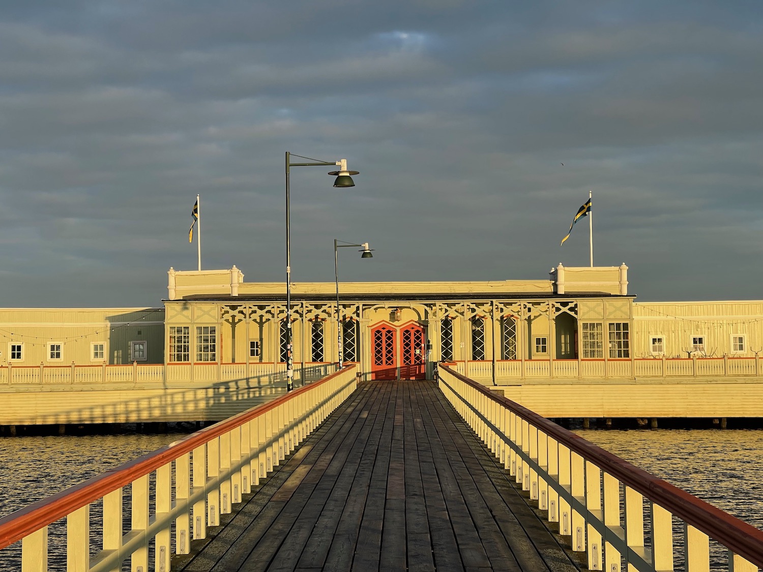 a dock leading to a building