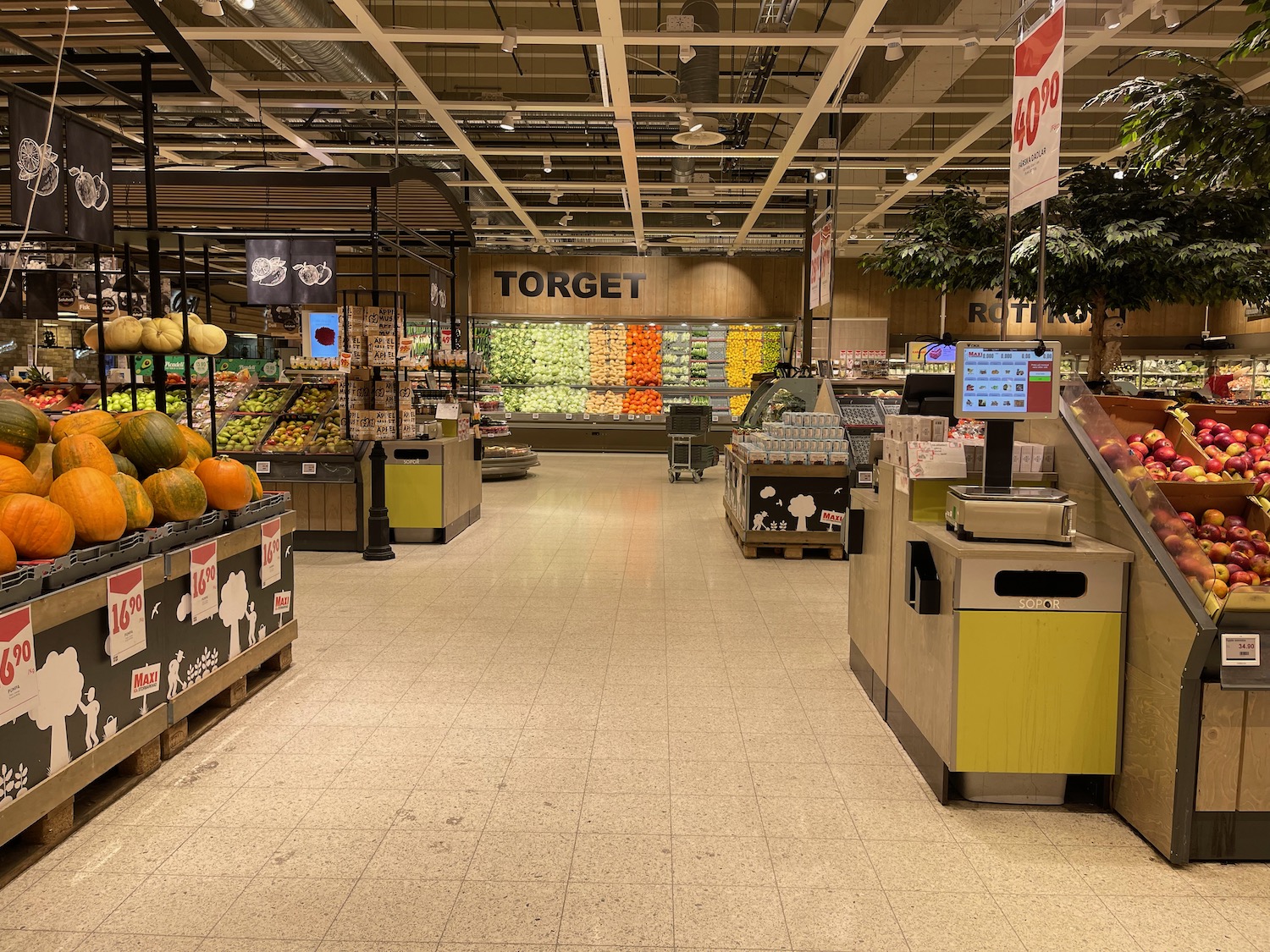 a grocery store with fruit and vegetables