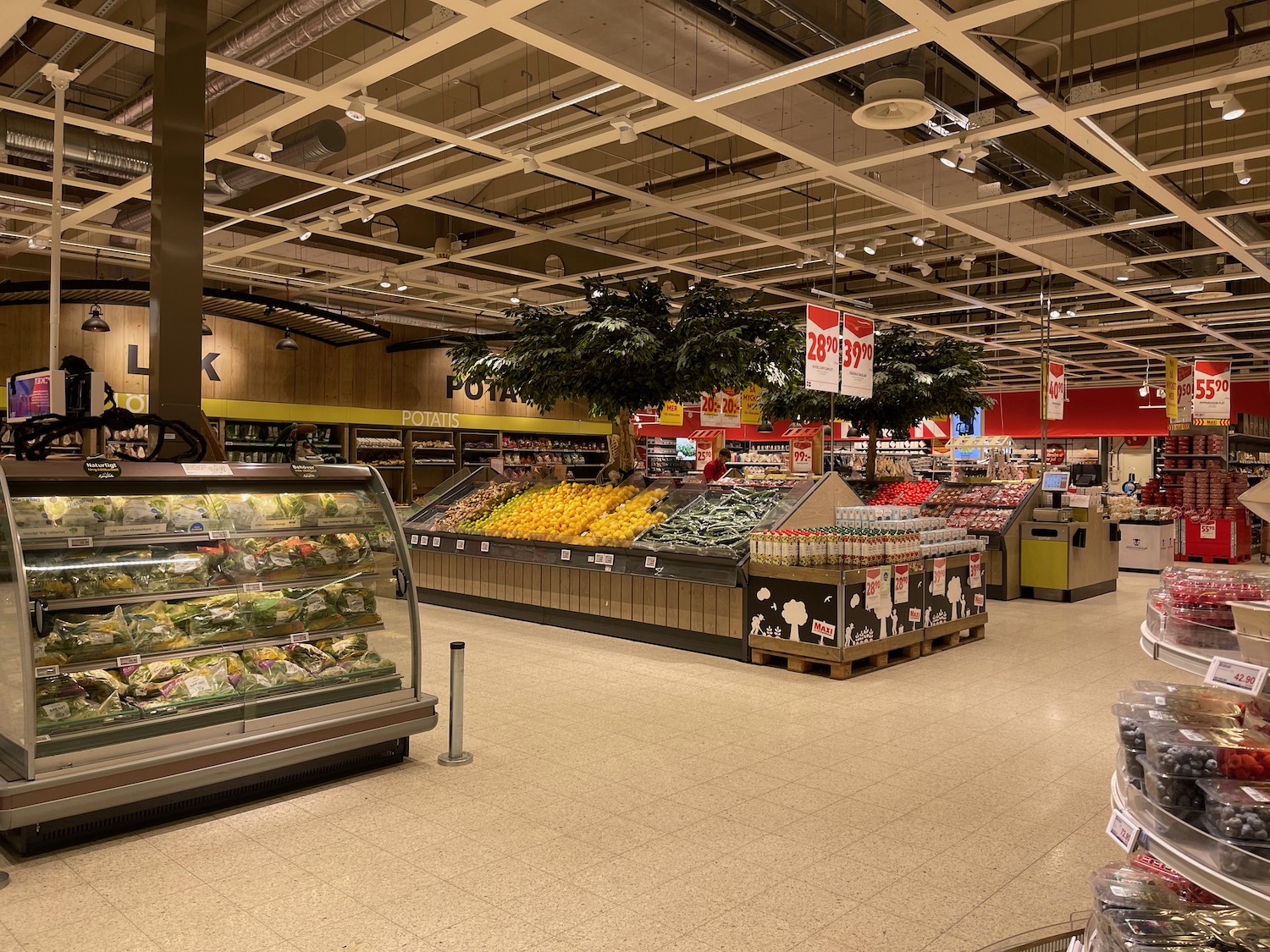 a grocery store with fruit and vegetables