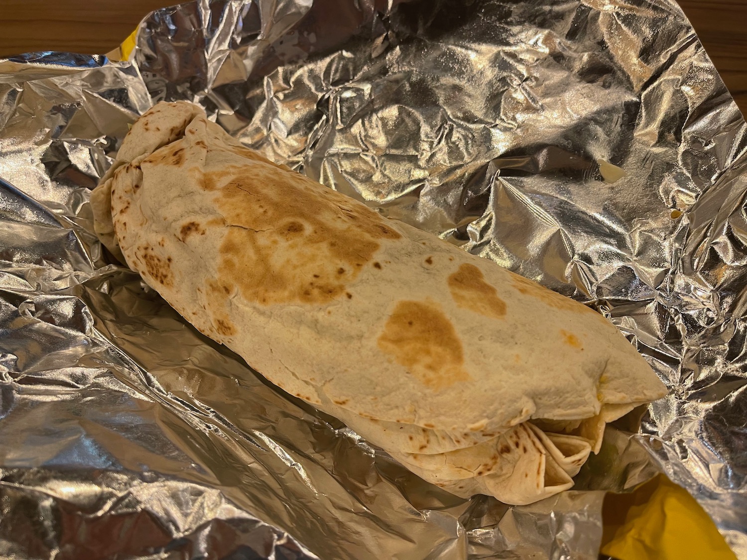 a burrito on a foil