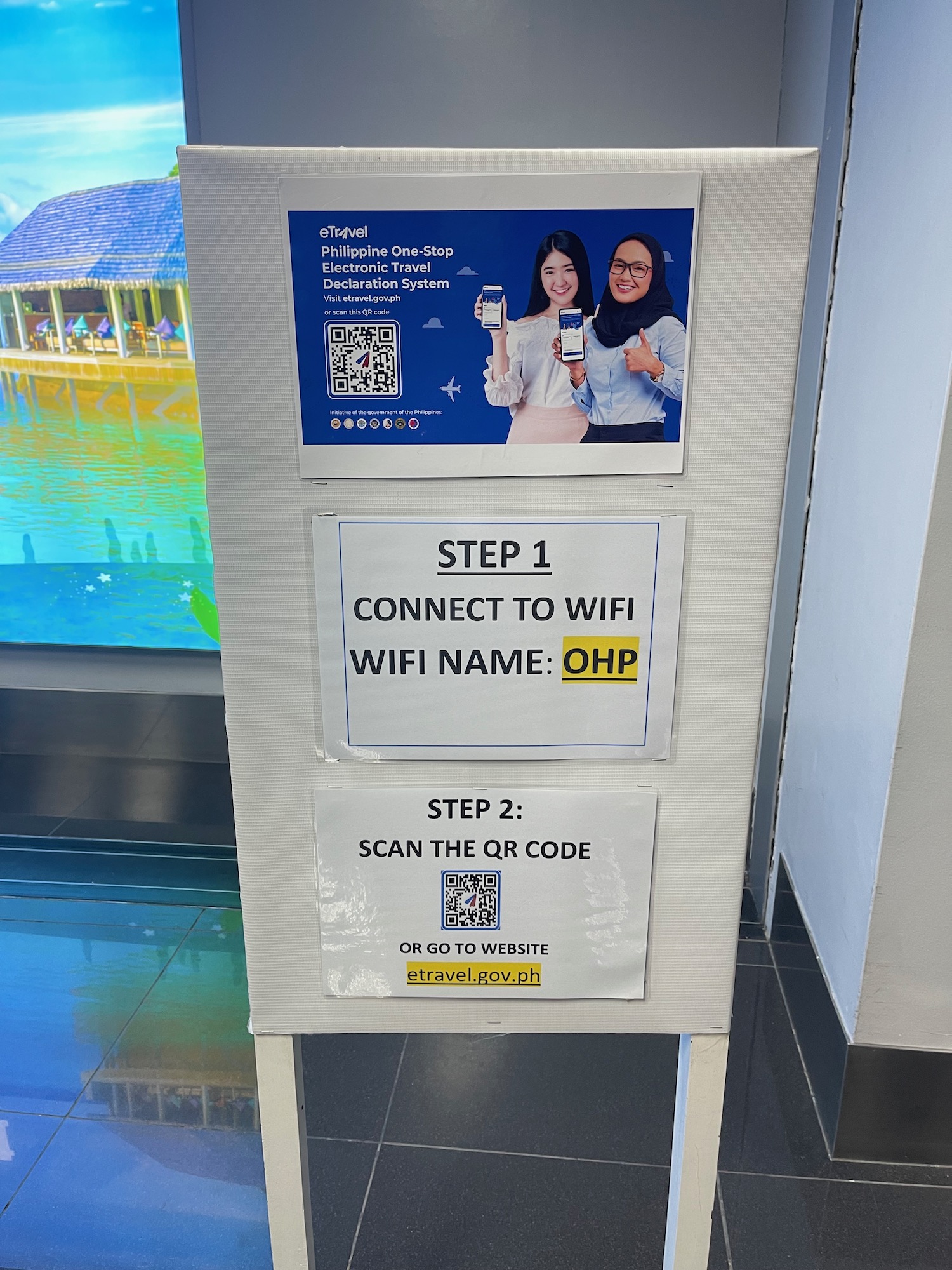 a sign with pictures of women and qr code