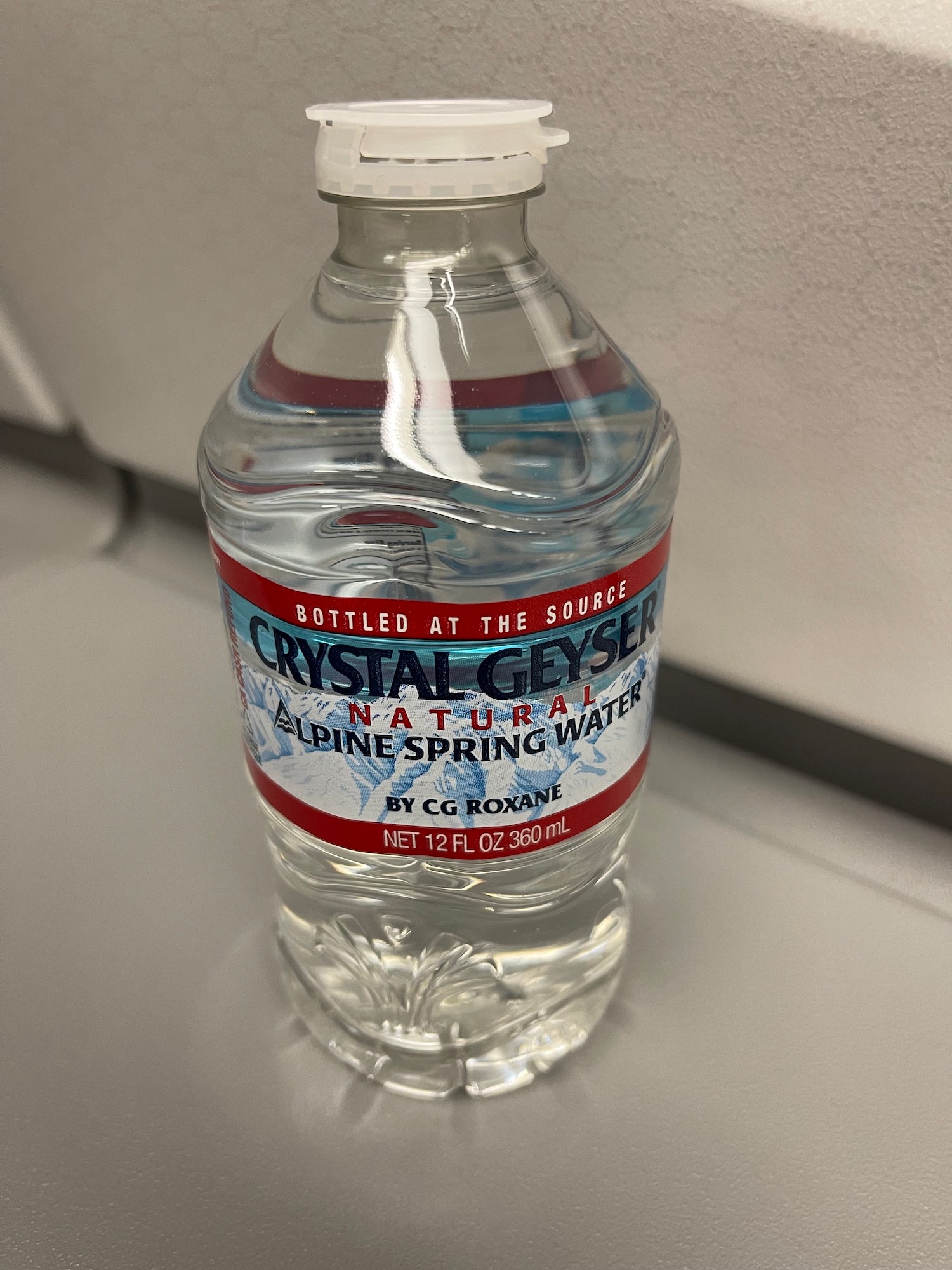 a bottle of water on a counter