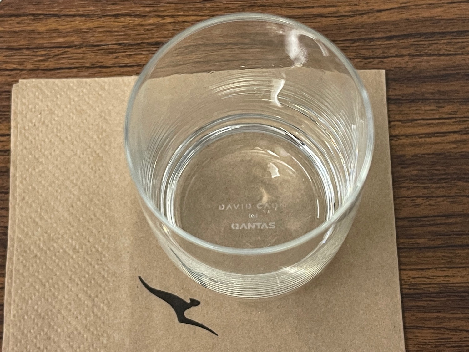 a glass on a napkin