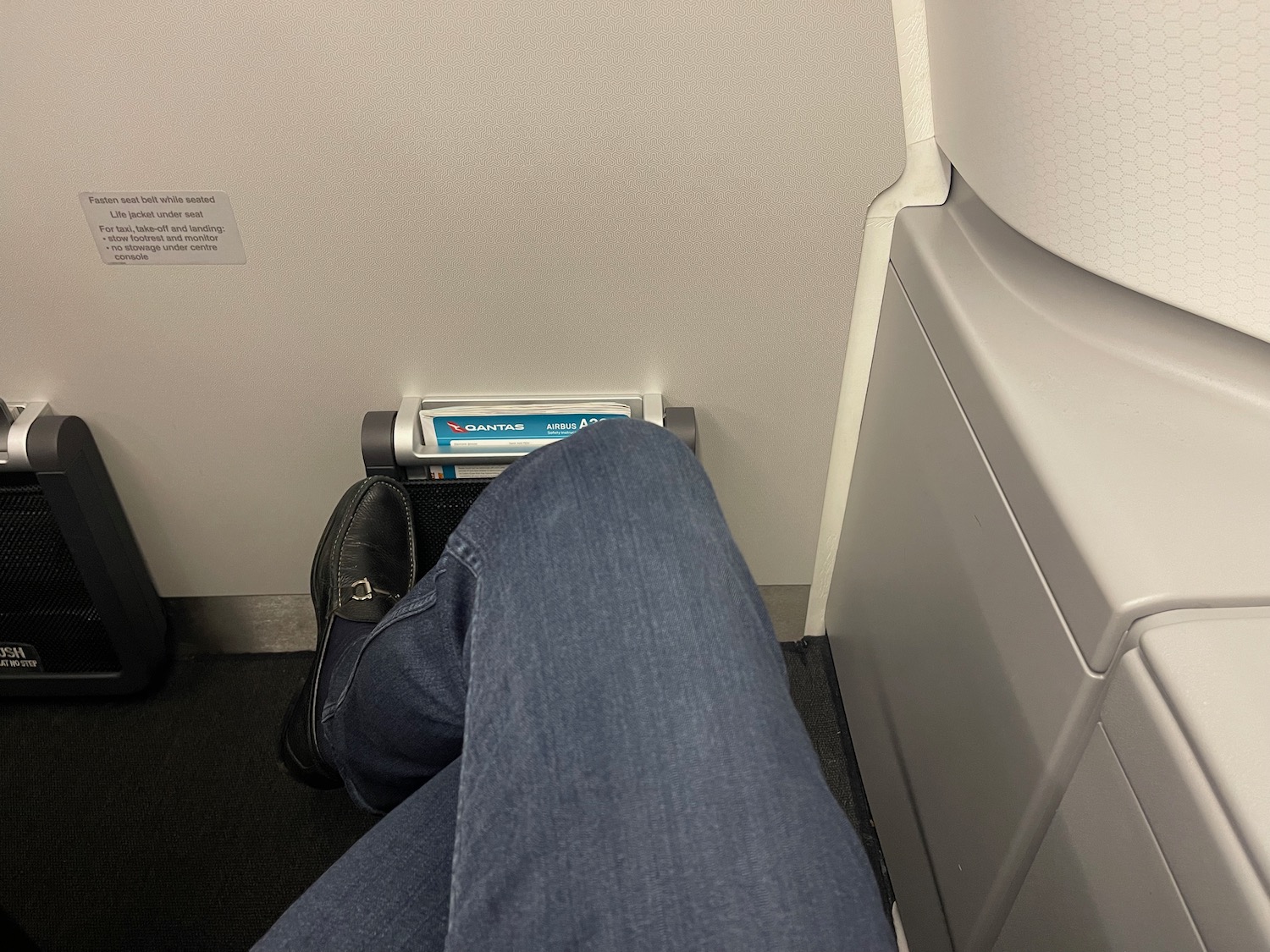 a person's leg in a seat