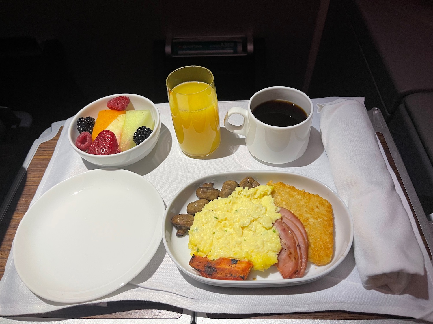 a plate of food and drinks on a table