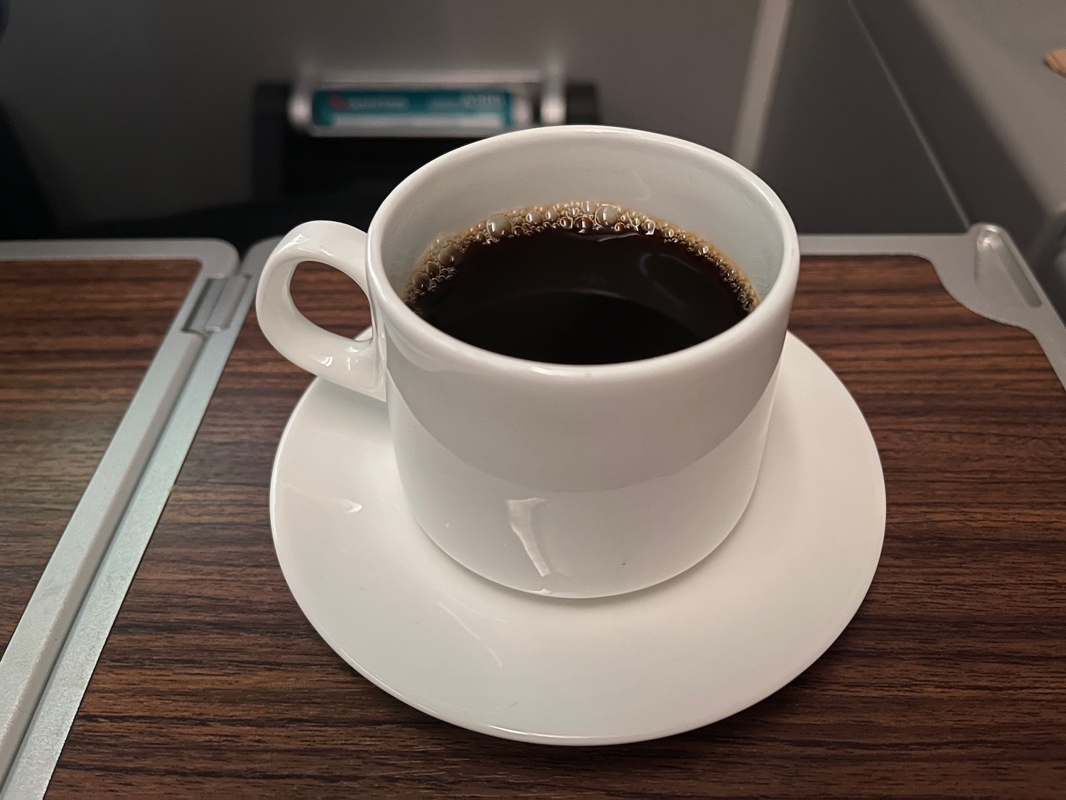 a cup of coffee on a saucer