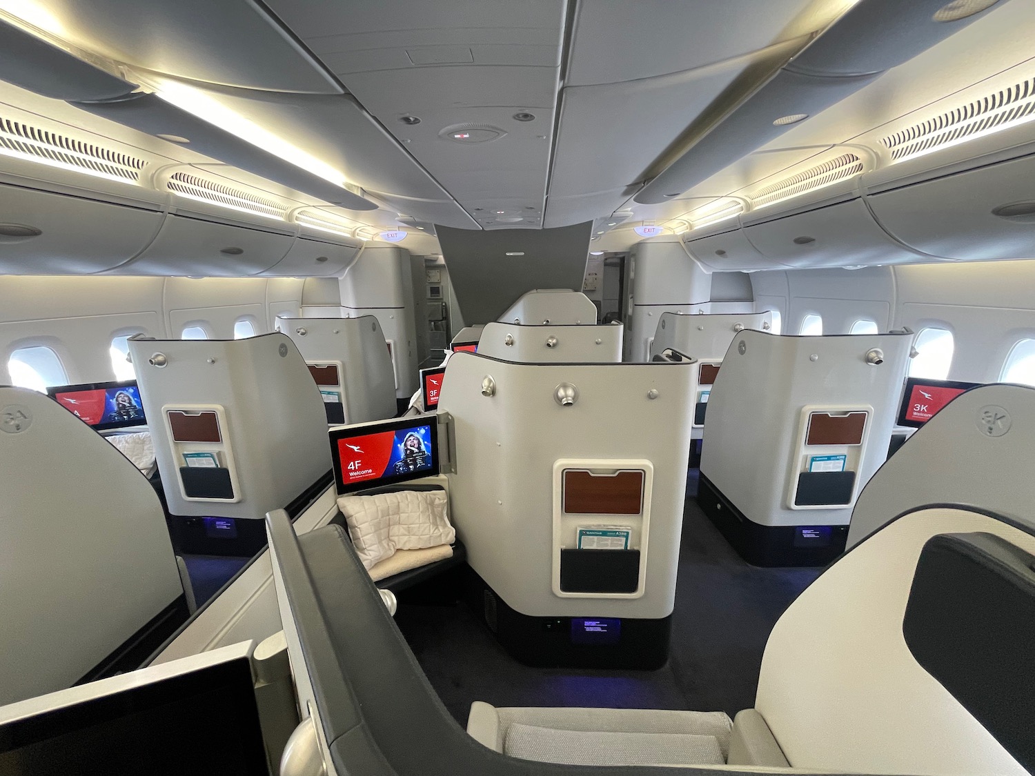 an airplane with seats and a television