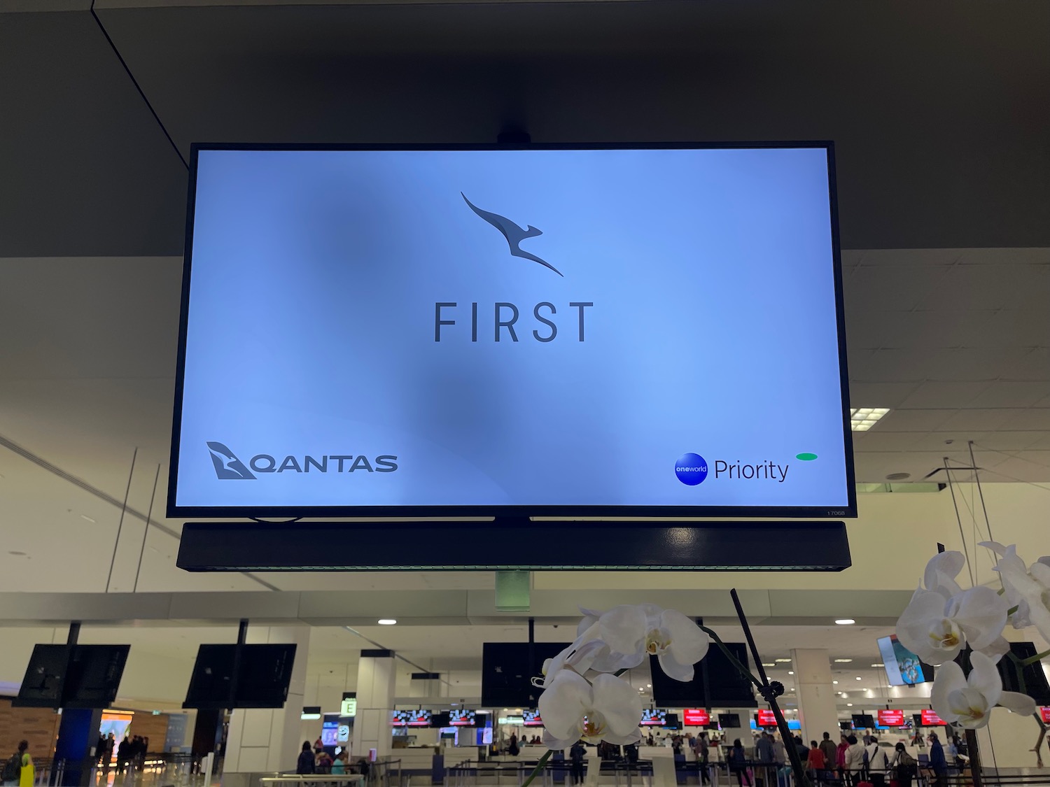 a large screen with a logo on it