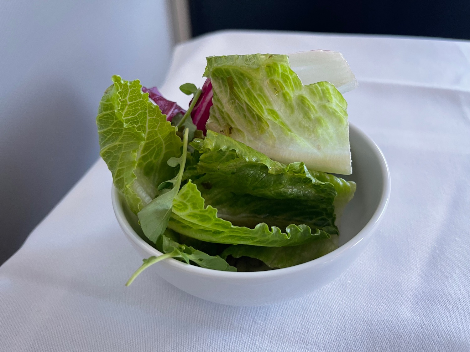 a bowl of lettuce and radish