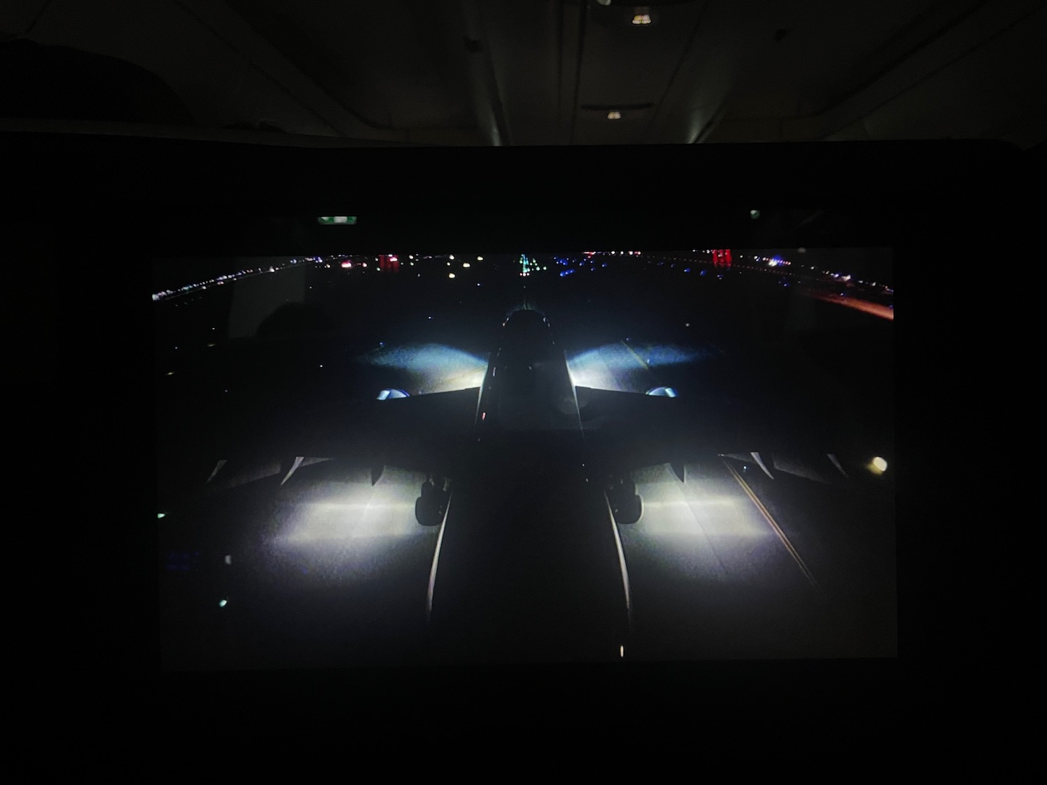 a plane on a runway at night