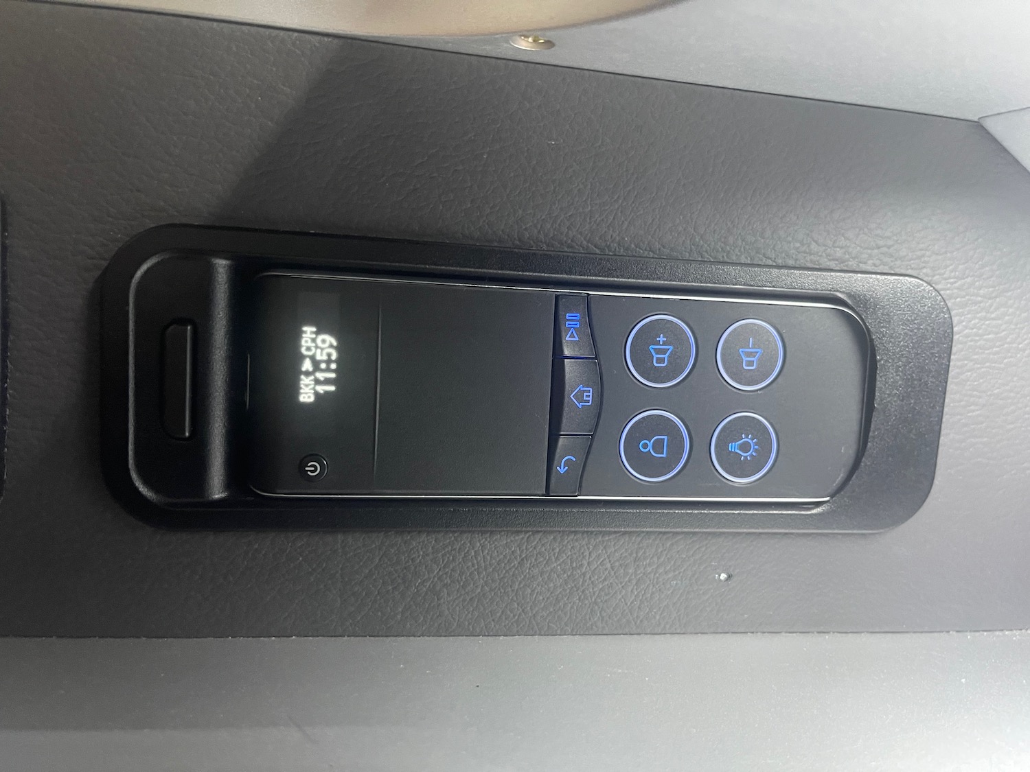 a black device with blue buttons