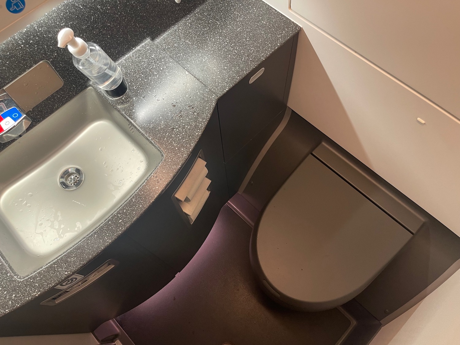 a sink and toilet in a bathroom