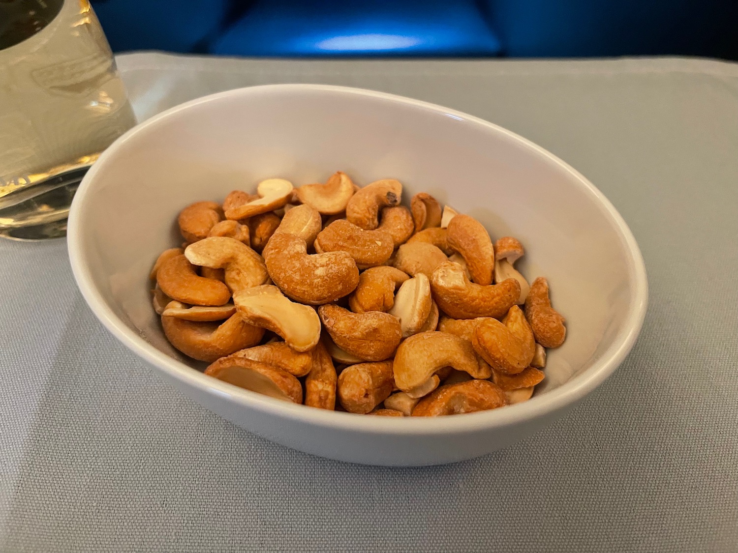 a bowl of cashews on a table