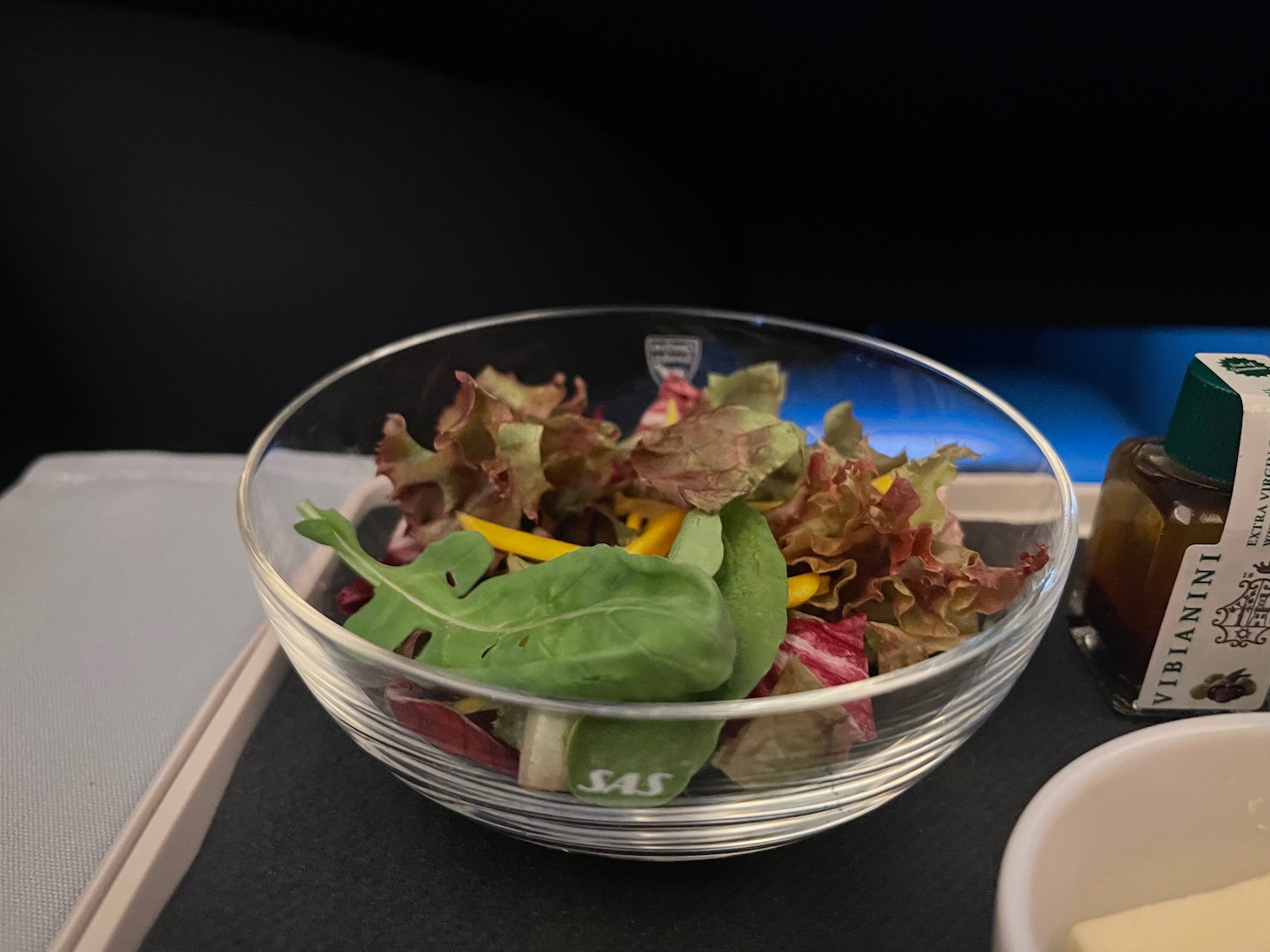 a bowl of salad on a table