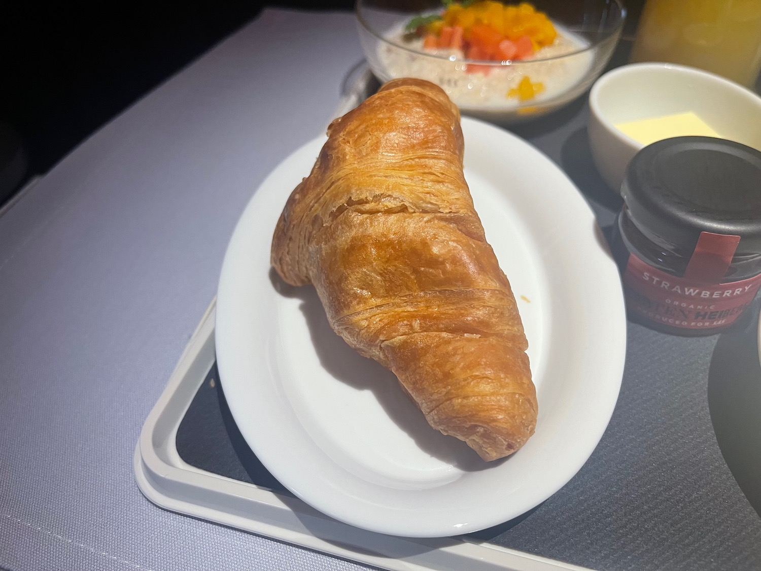 a croissant on a plate