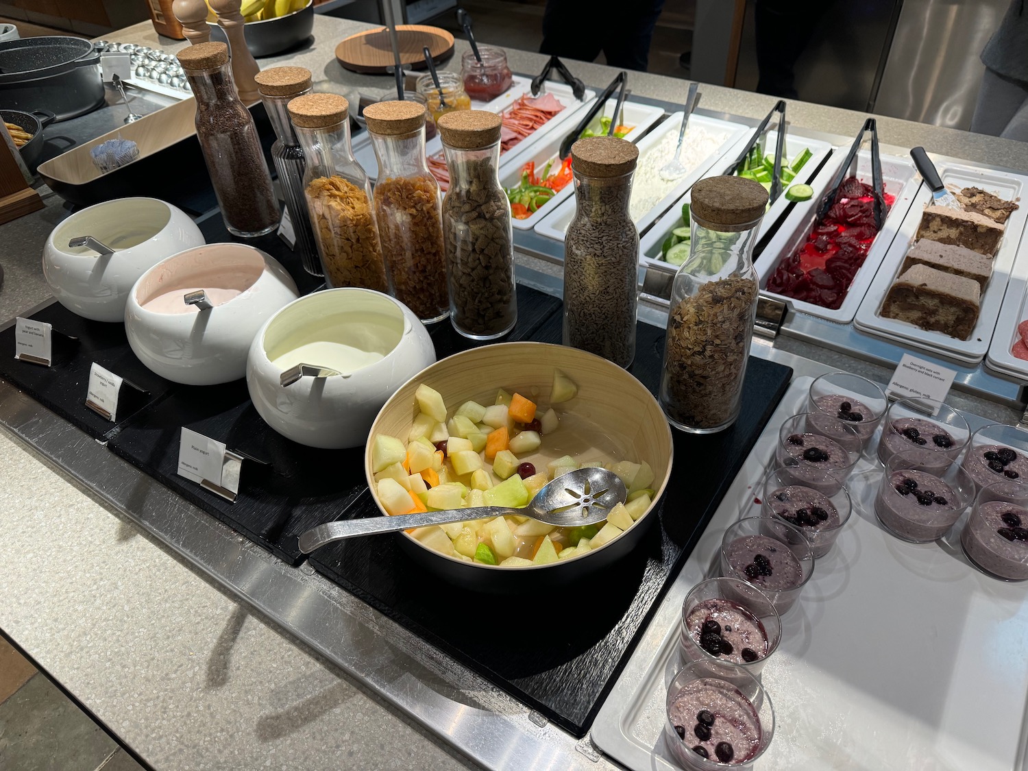 a buffet table with food and condiments