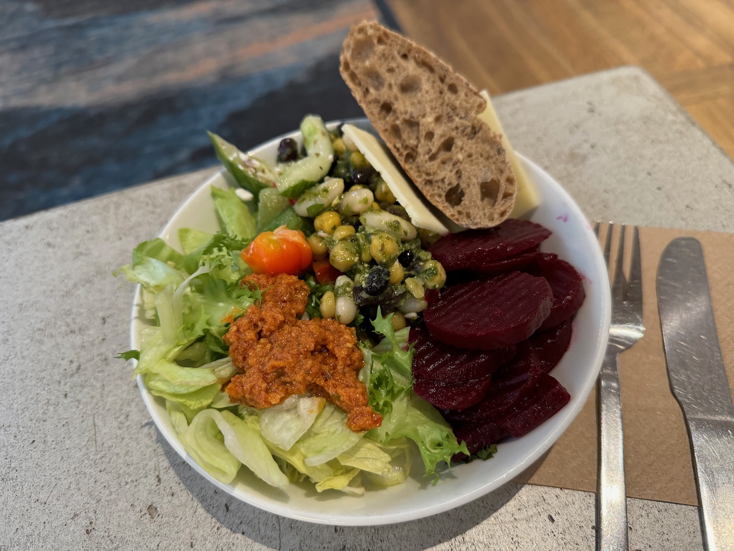 a bowl of salad with a fork