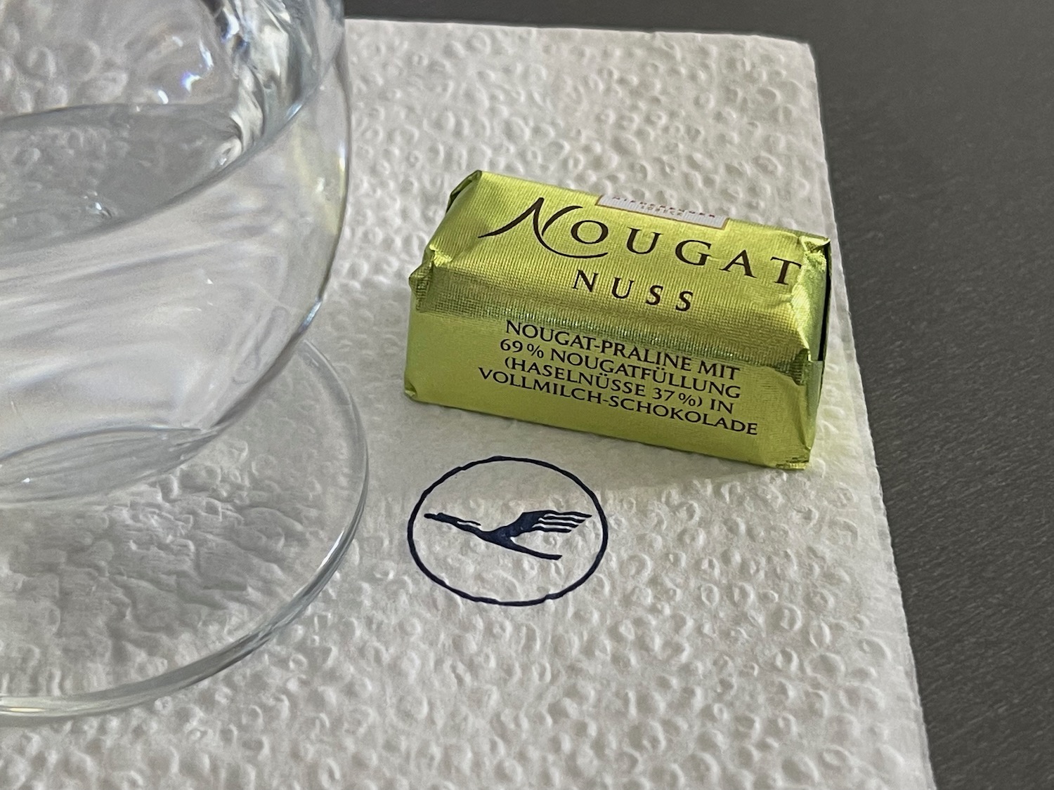 a small package of chocolate on a napkin