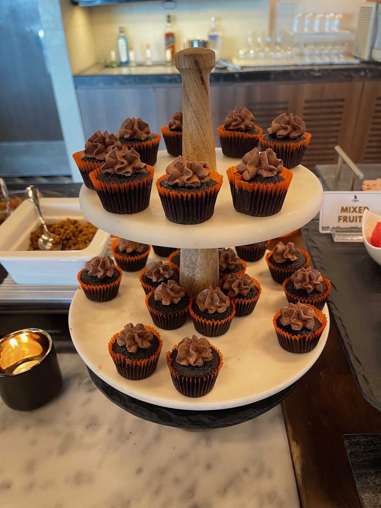 a tray of cupcakes on a table