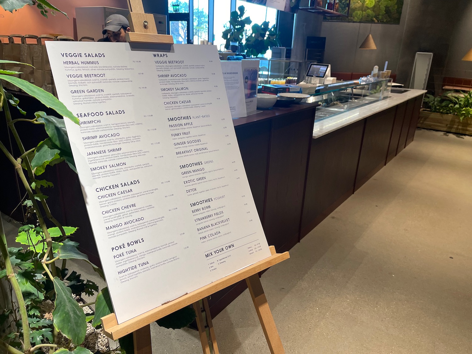 a menu on a stand in a restaurant