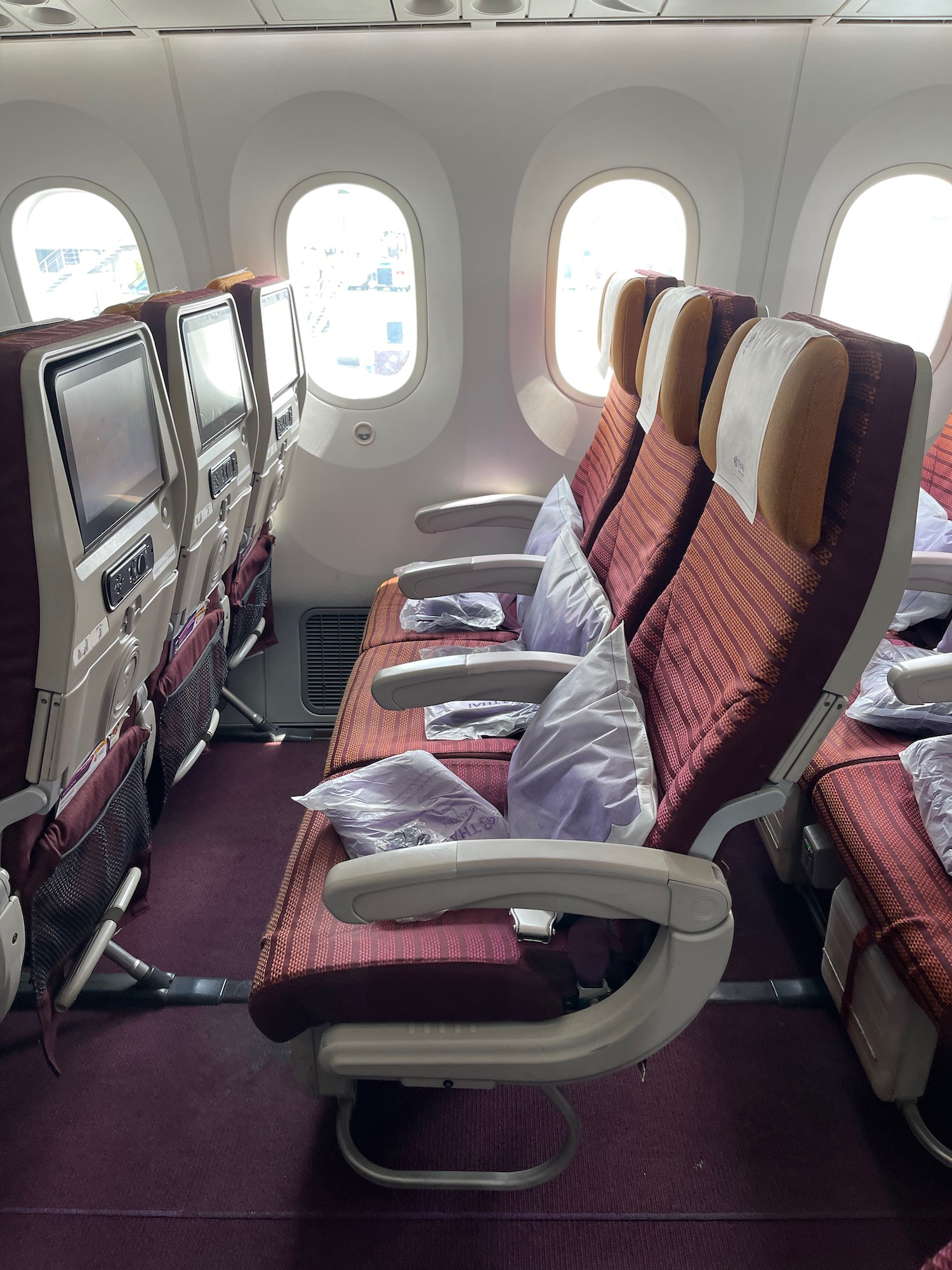 rows of seats in an airplane