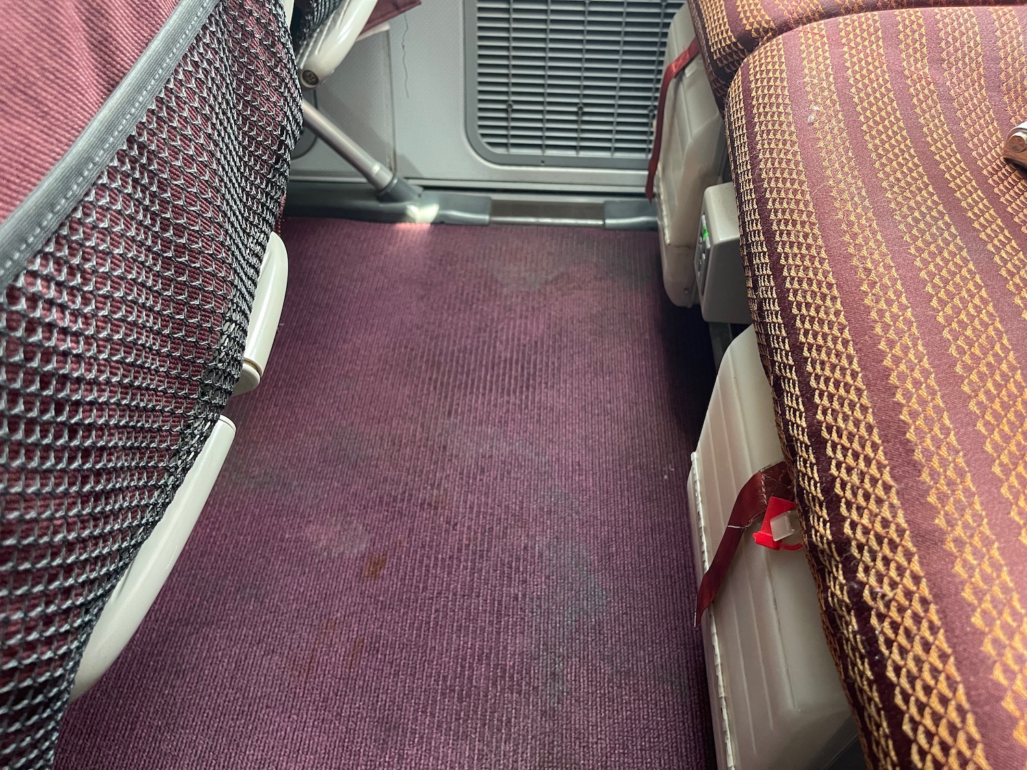 a seat and a vent in a bus