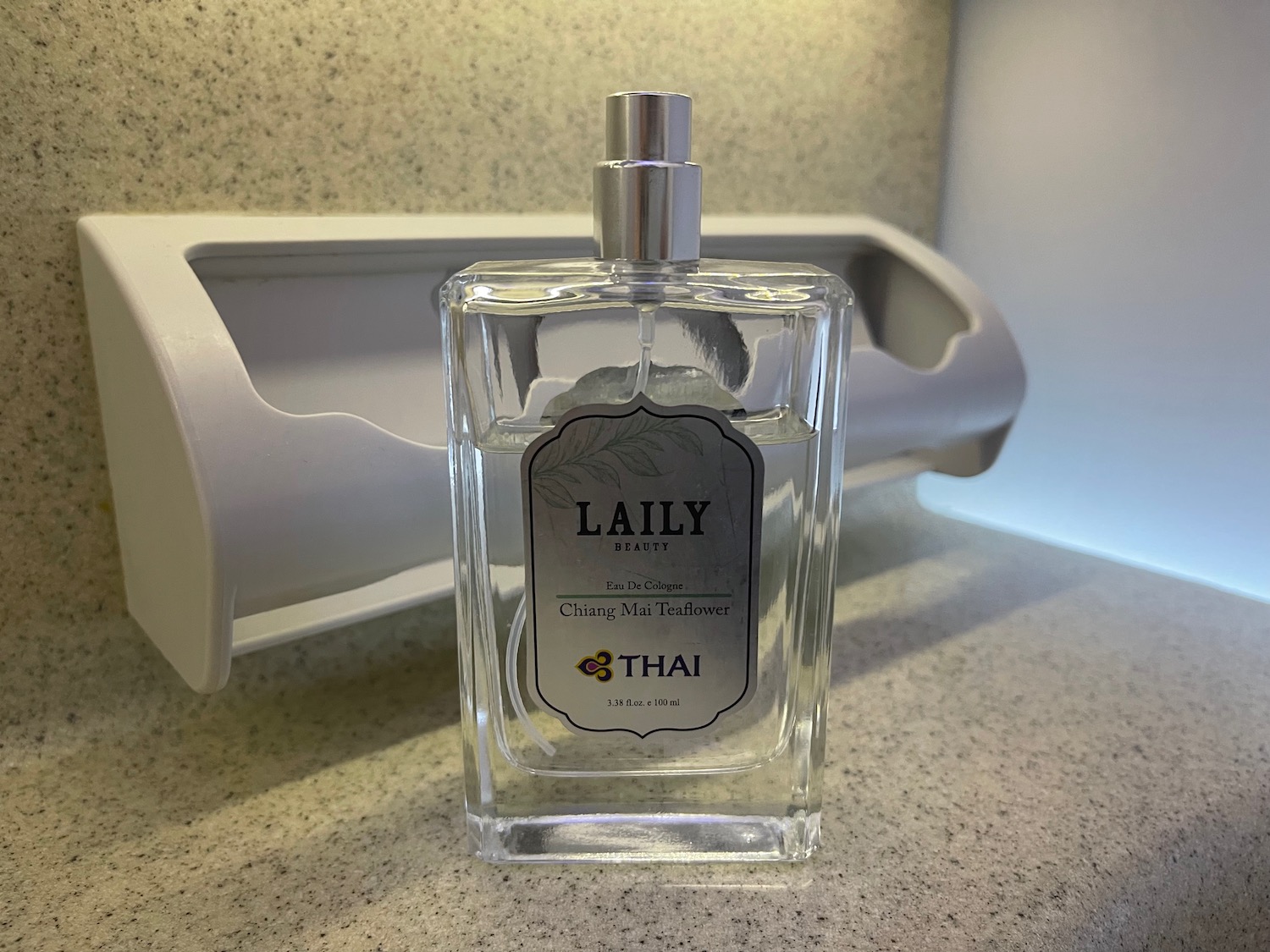 a bottle of perfume on a counter