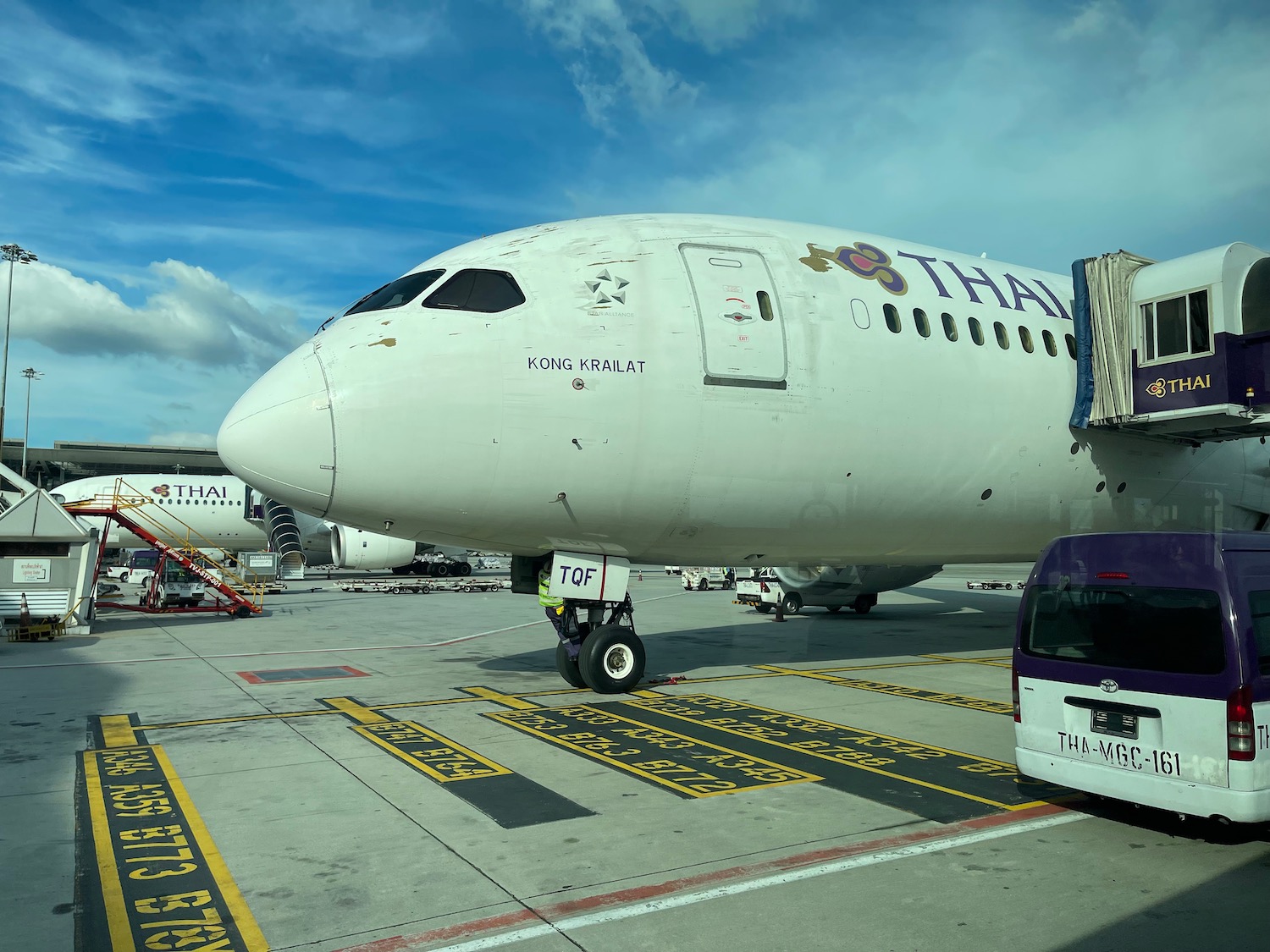 a white airplane on a tarmac