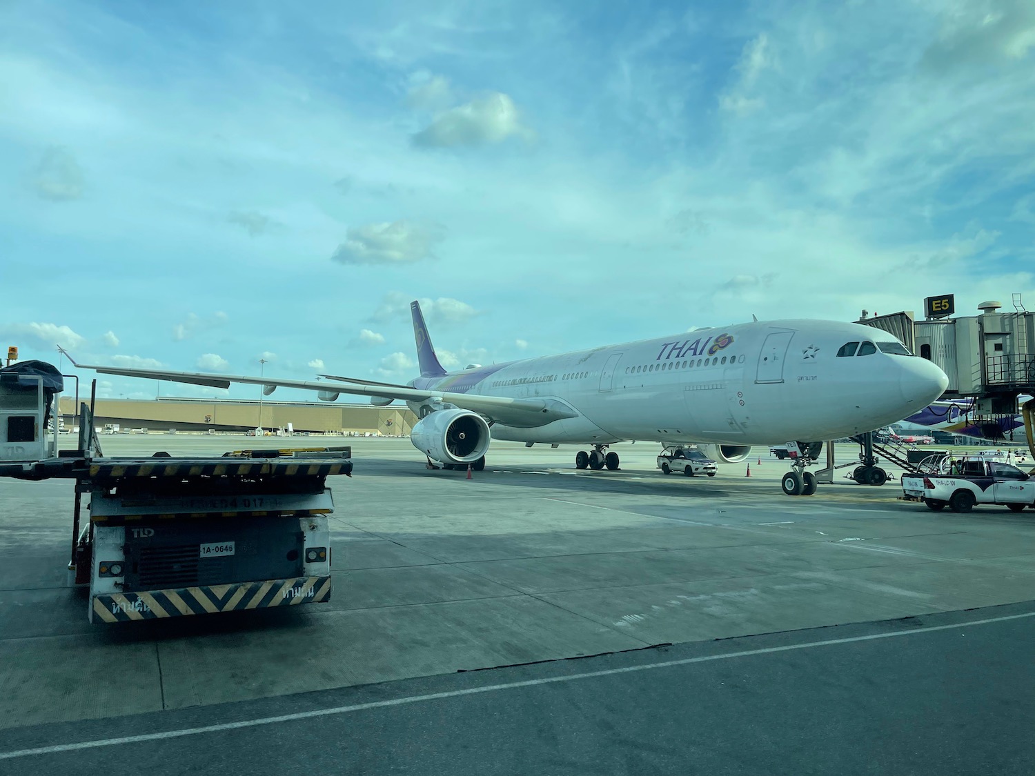 a large white airplane on a tarmac