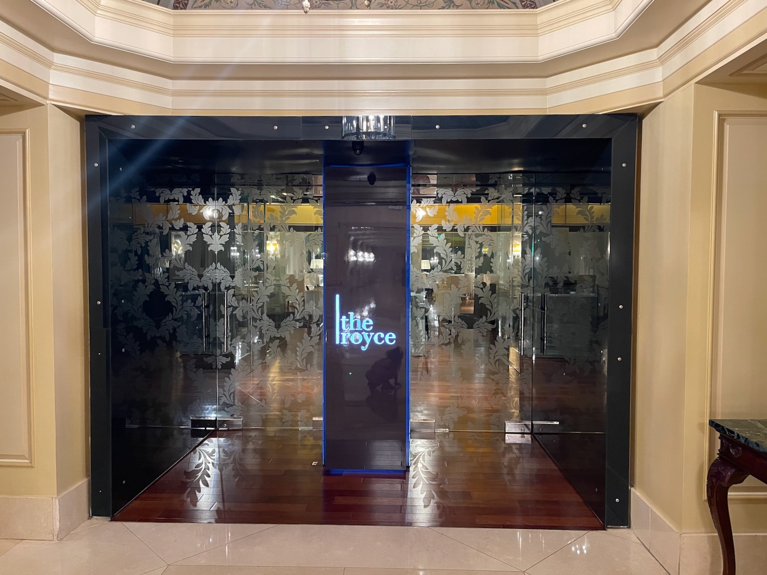 a glass door with a logo on it