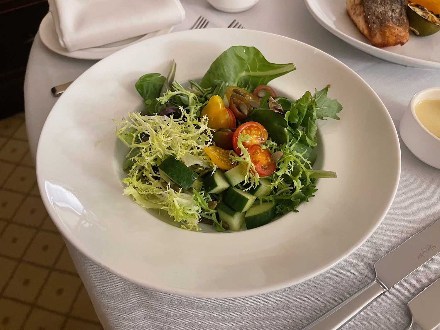 a plate of salad on a table