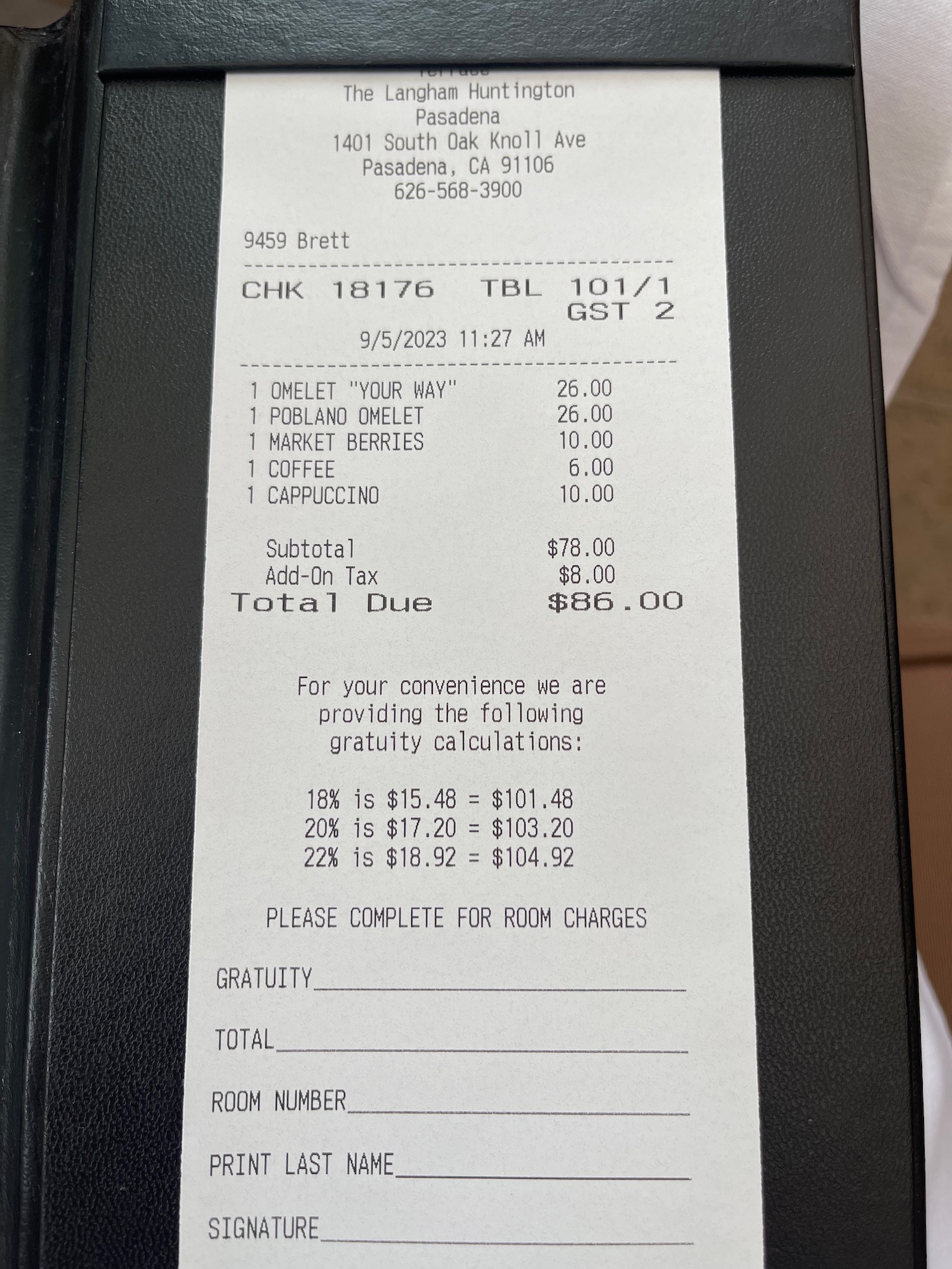 a receipt on a black book