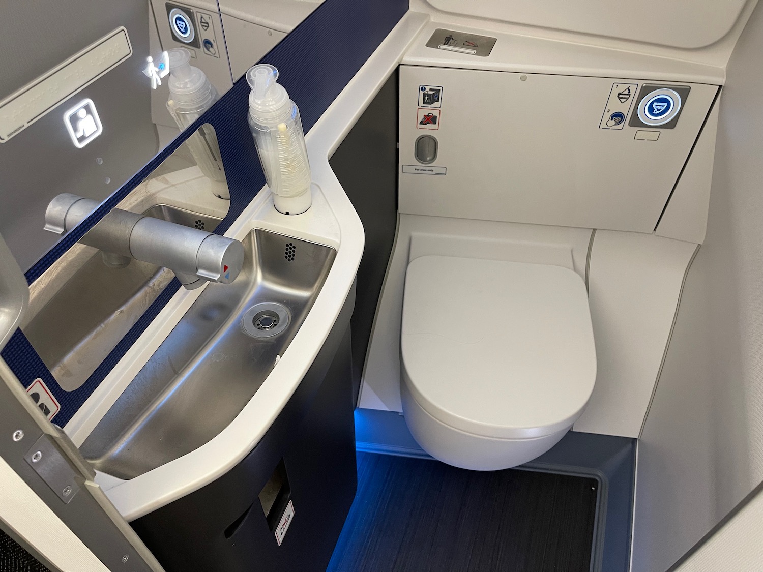 a sink and toilet in a plane