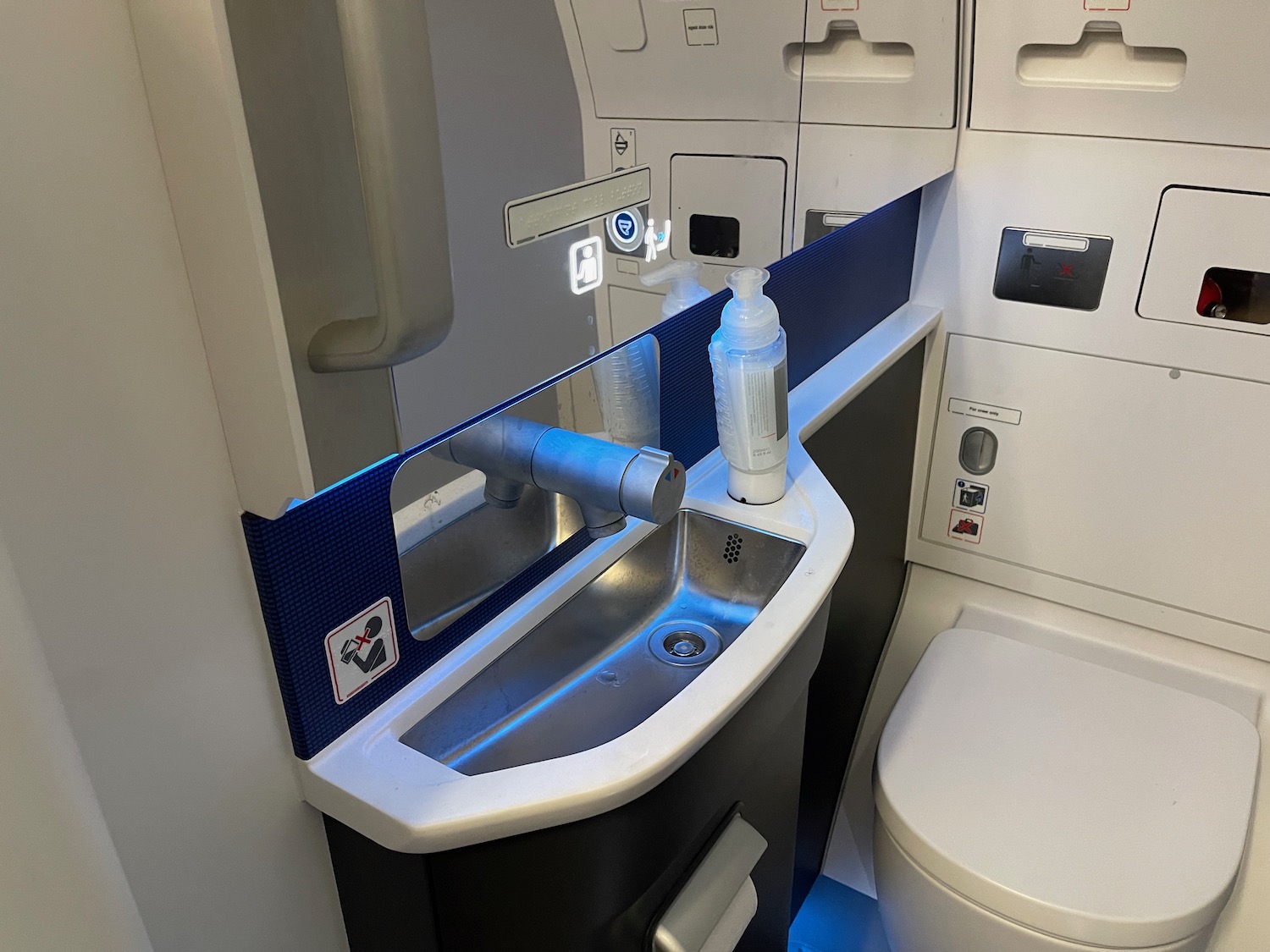 a sink and toilet in a plane