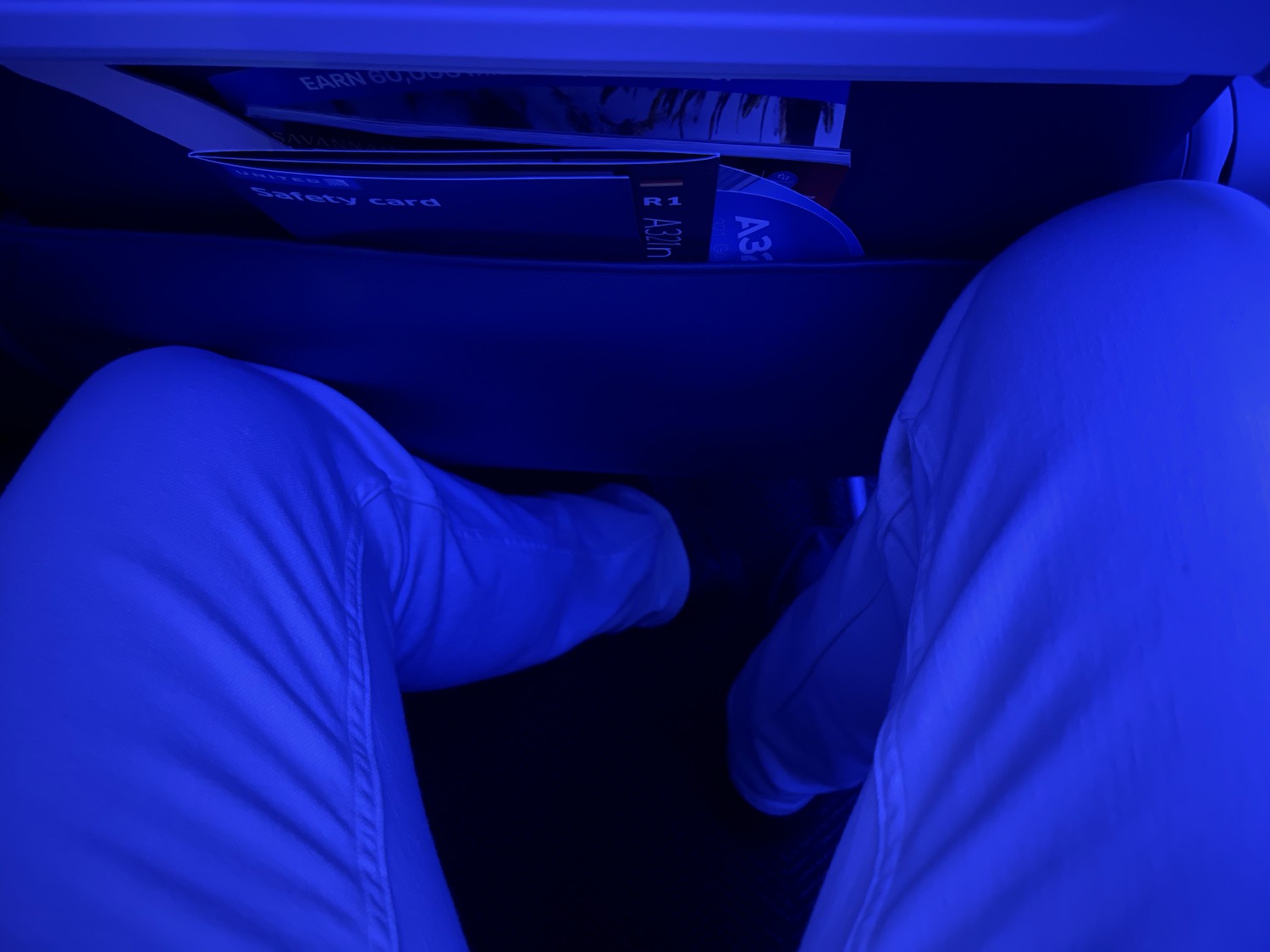 a person's legs in a blue light