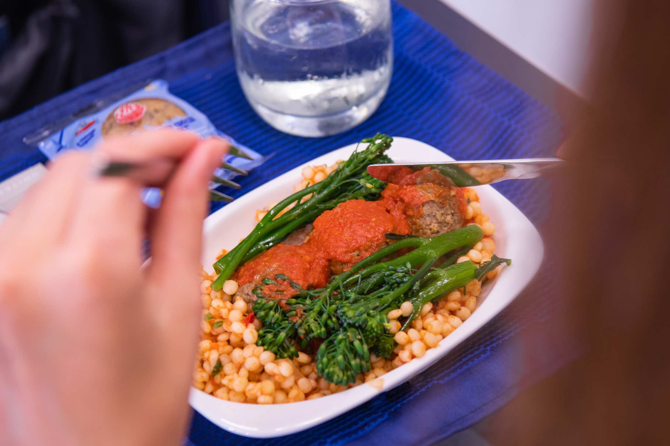 a plate of food with a knife and fork