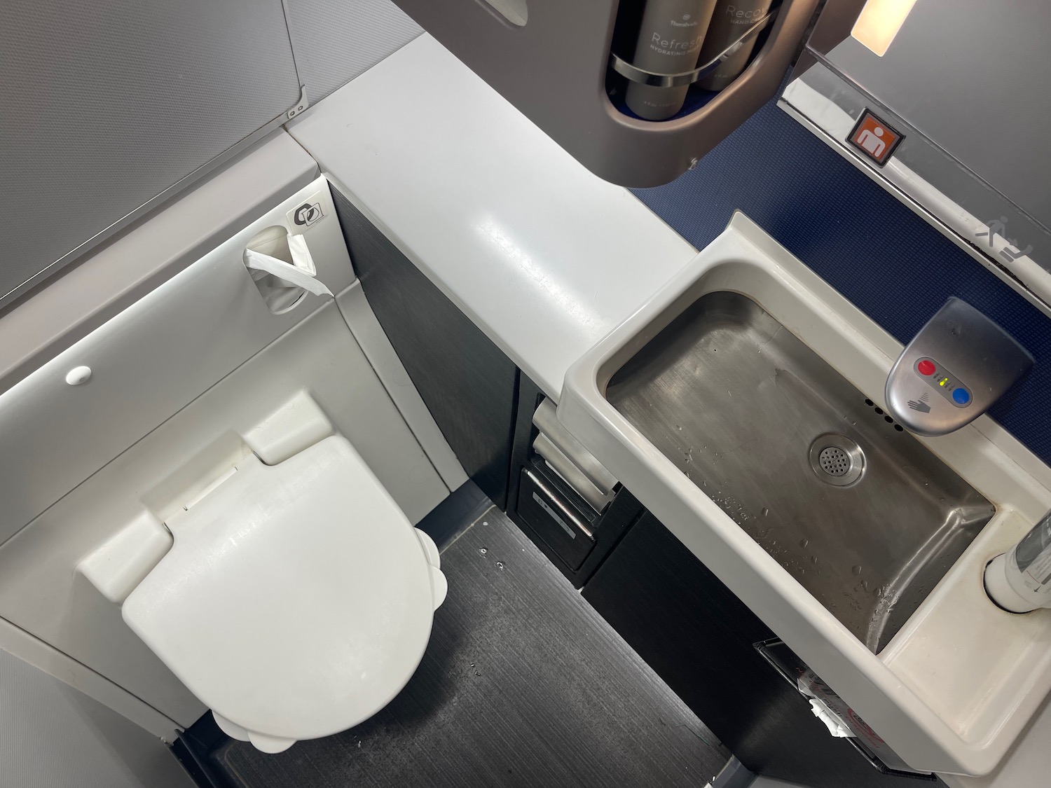 a bathroom with a sink and toilet