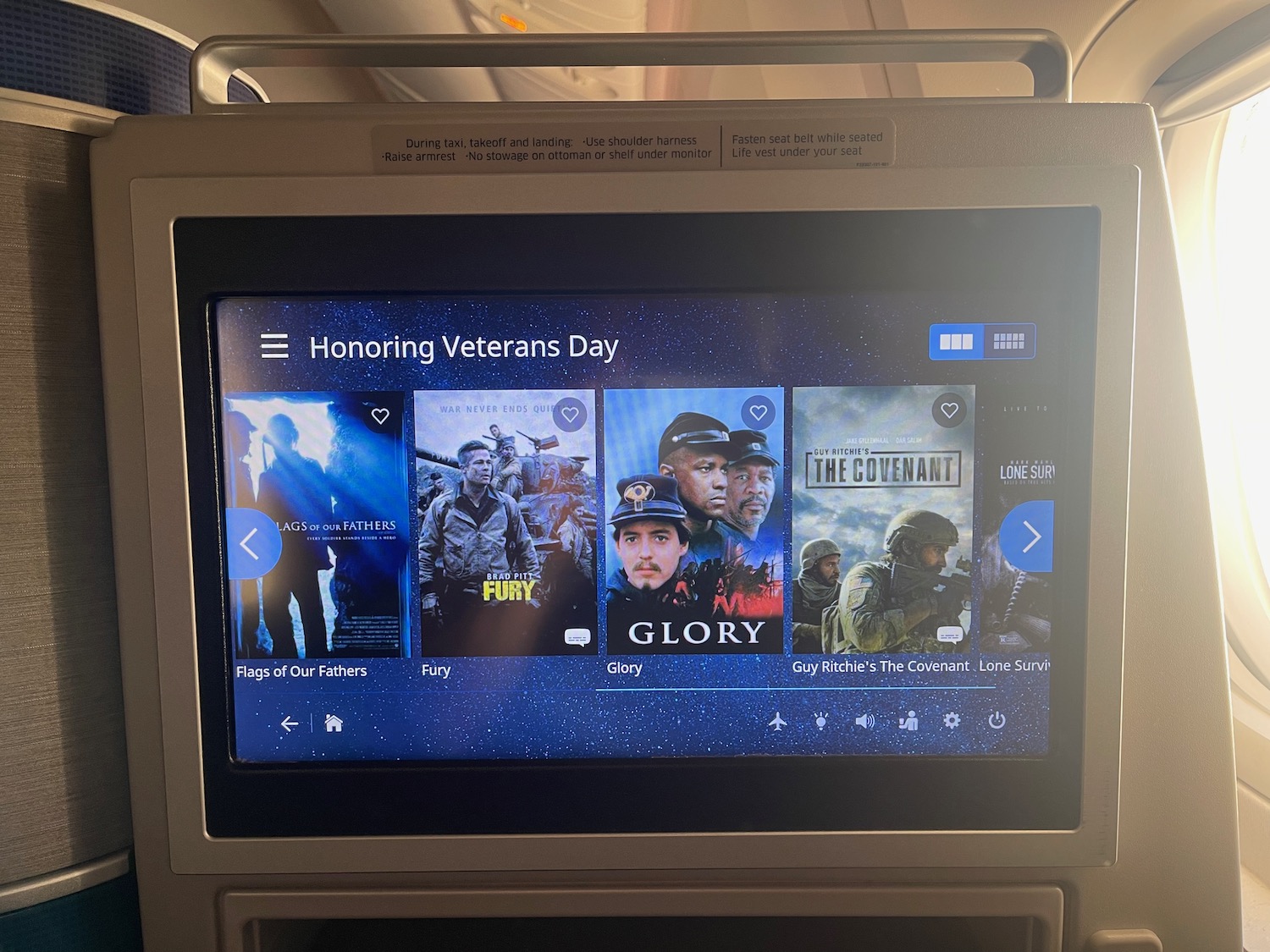 a screen with a picture of soldiers on it