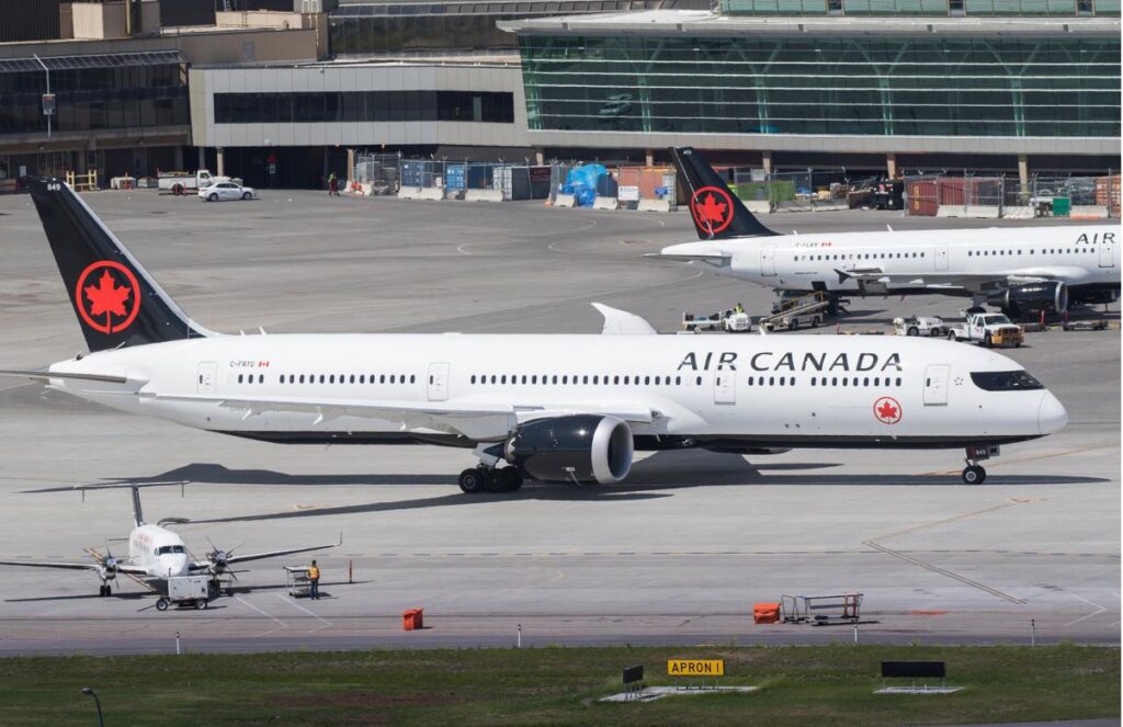 air-canada-passenger-restrained-after-trying-to-open-aircraft-door-on